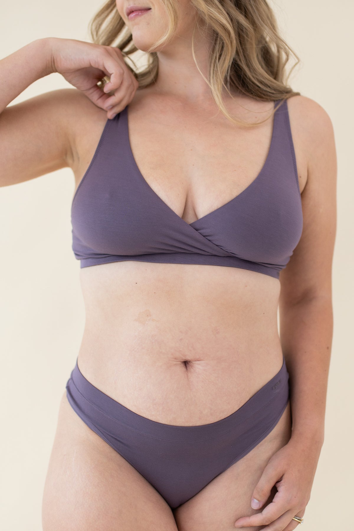 Female modeling the Women's Cross Front Bralette in Currant and matching underwear