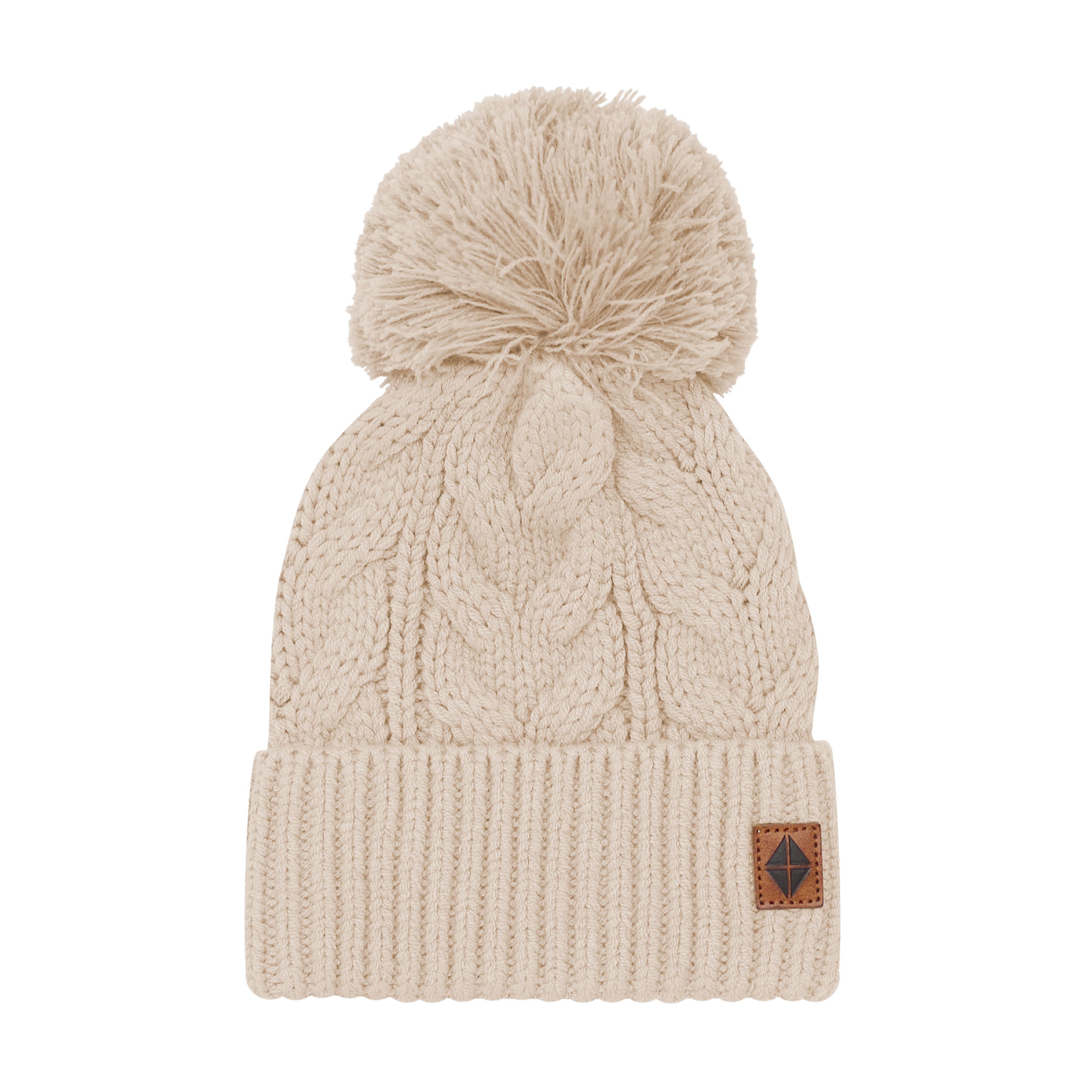 Product photo of the Chunky Cable Knit Beanie in Almond with the Kyte Baby Vegan leather tag visible