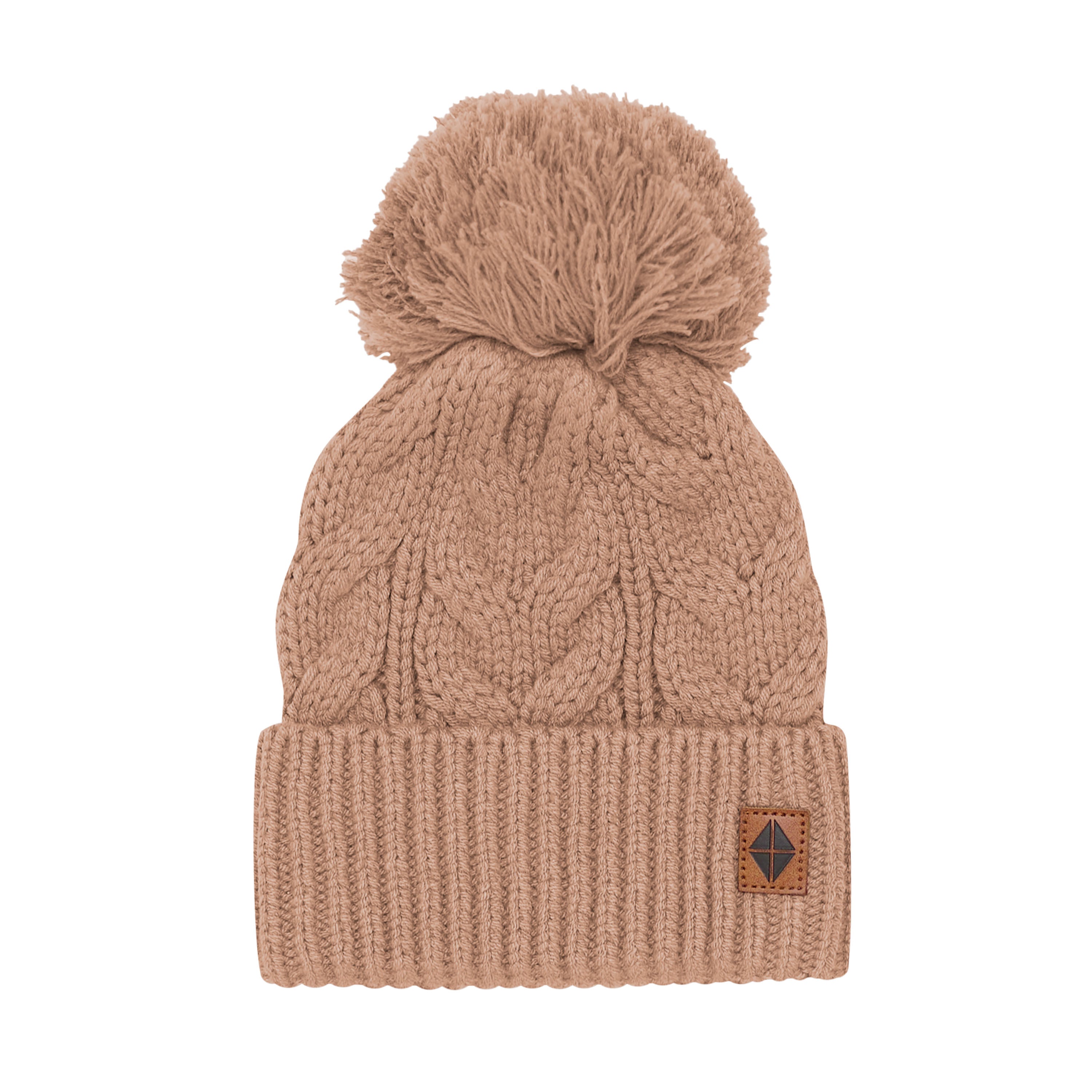 Product photo of the Chunky Cable Knit Beanie in Latte with the Kyte Baby vegan leather tag visible