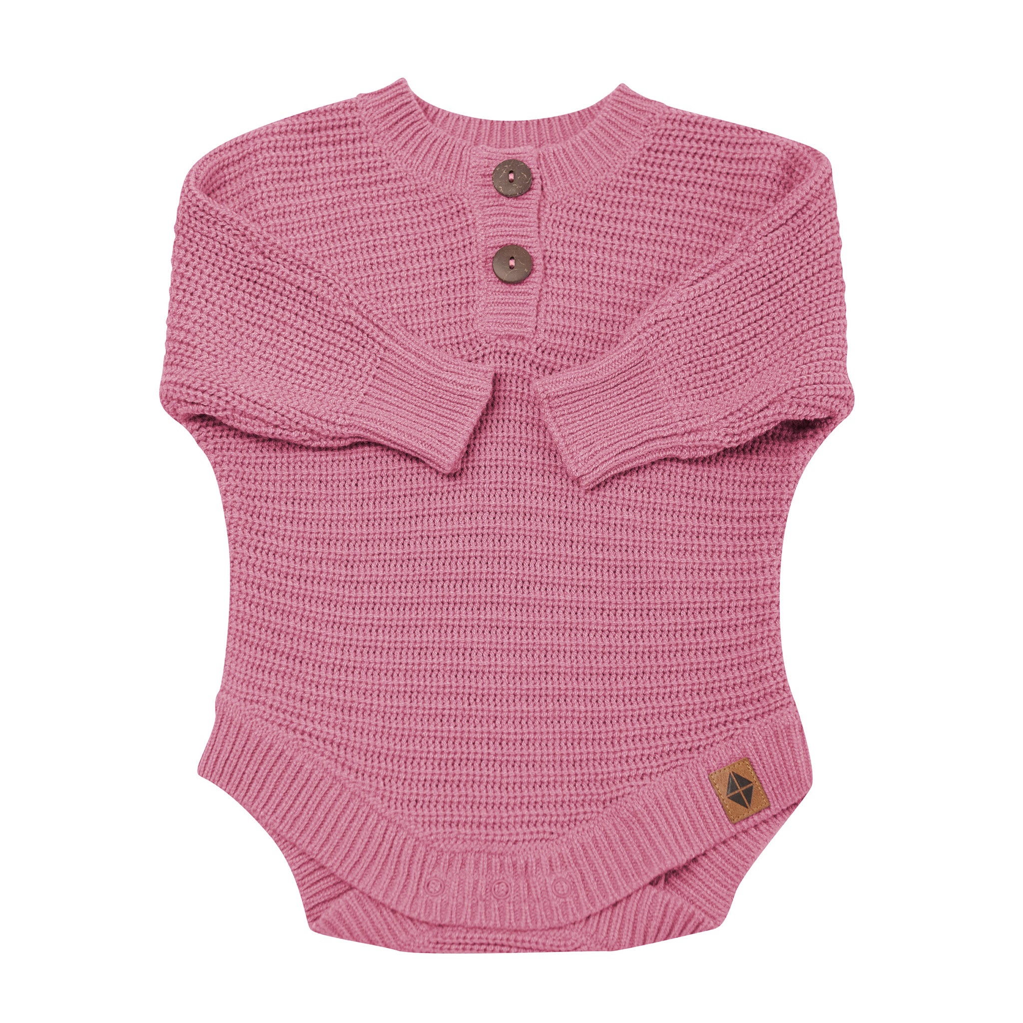 Chunky Knit Romper in Apple Blossom shown with the arms folded inwards