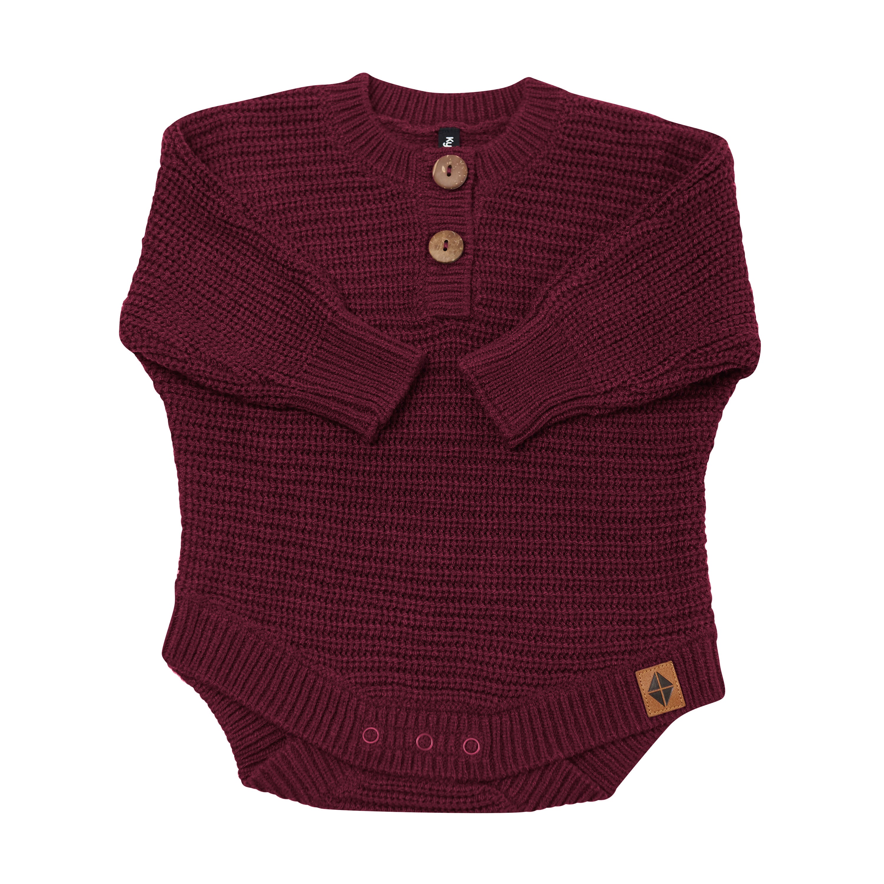 Chunky Knit Romper in Burgundy shown with the arms folded inwards
