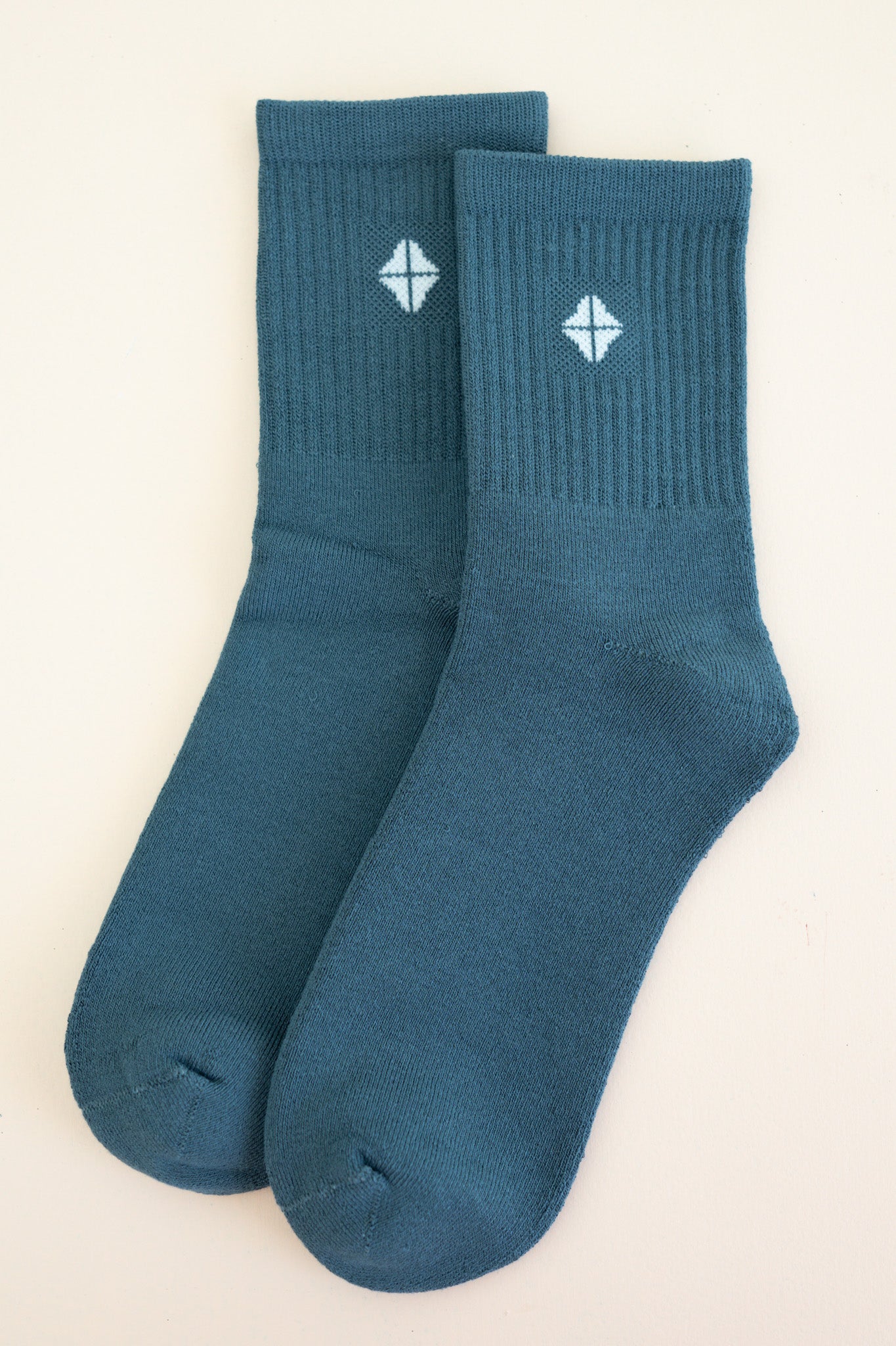 Adult Crew Socks in Atlantic shown side by side on a light neutral background