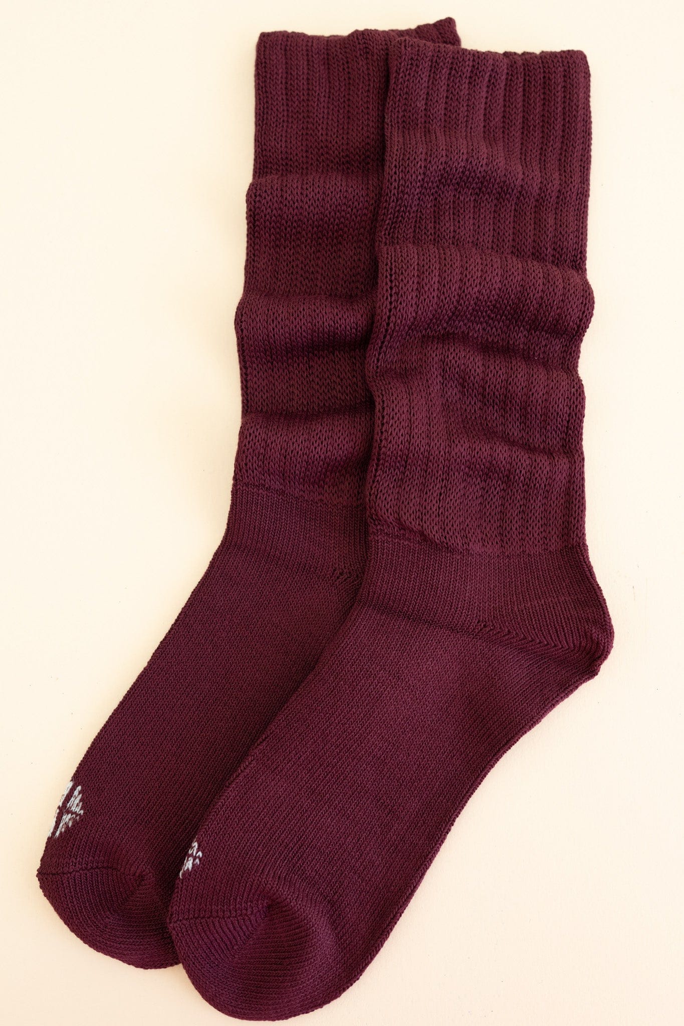 Adult Scrunch Socks in Burgundy shown laying side by side on a light neutral background