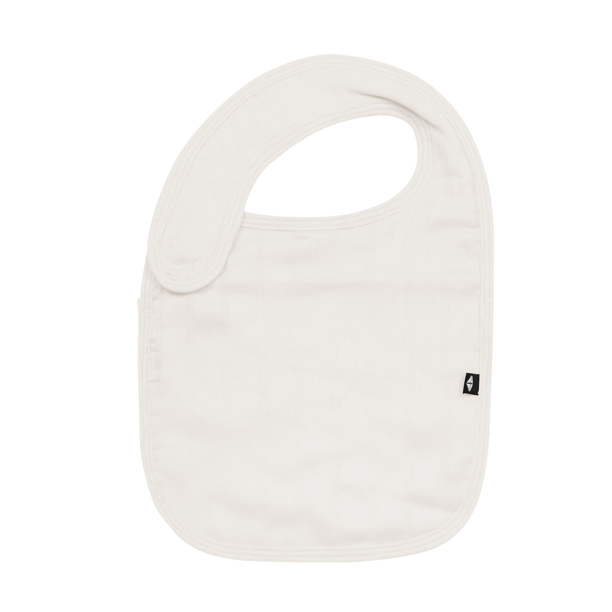 Front of Kyte Baby Muslin Bib in Oat