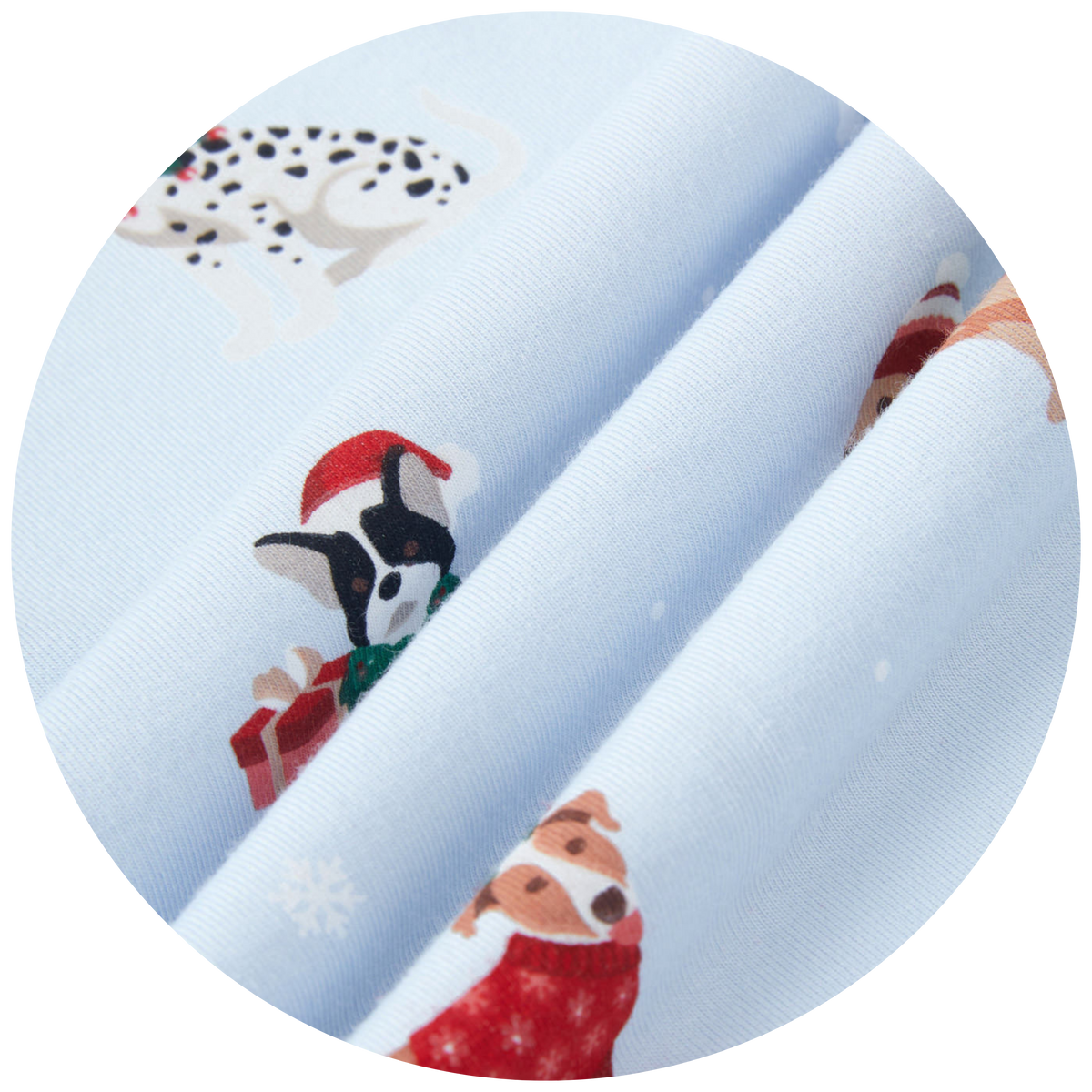 swatch of blue fabric with dogs wearing holiday accessories