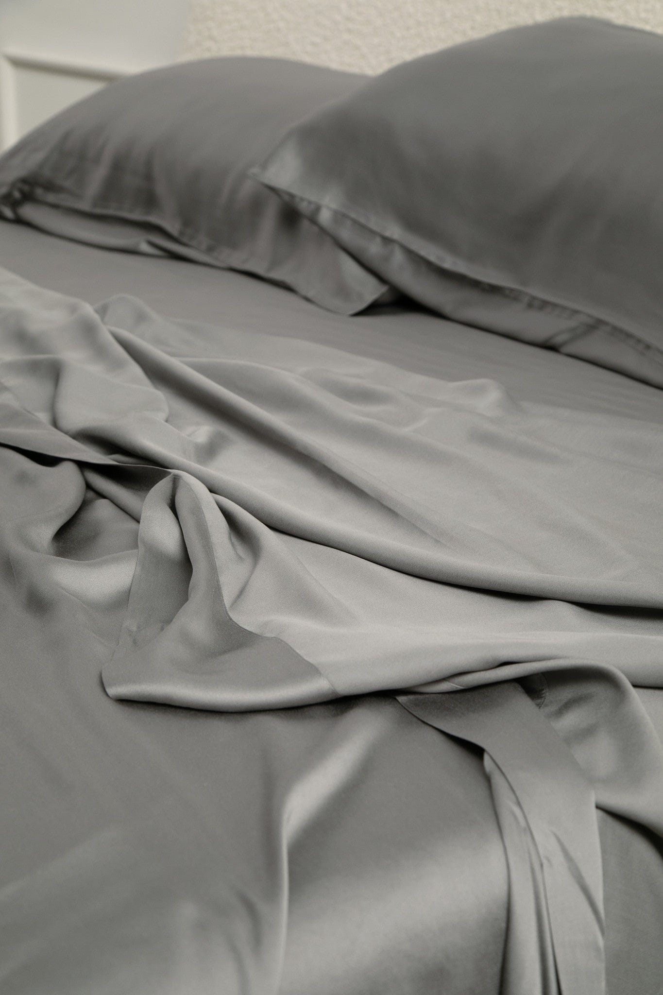 Bamboo Sateen Sheet Set in Ash shown on a bed