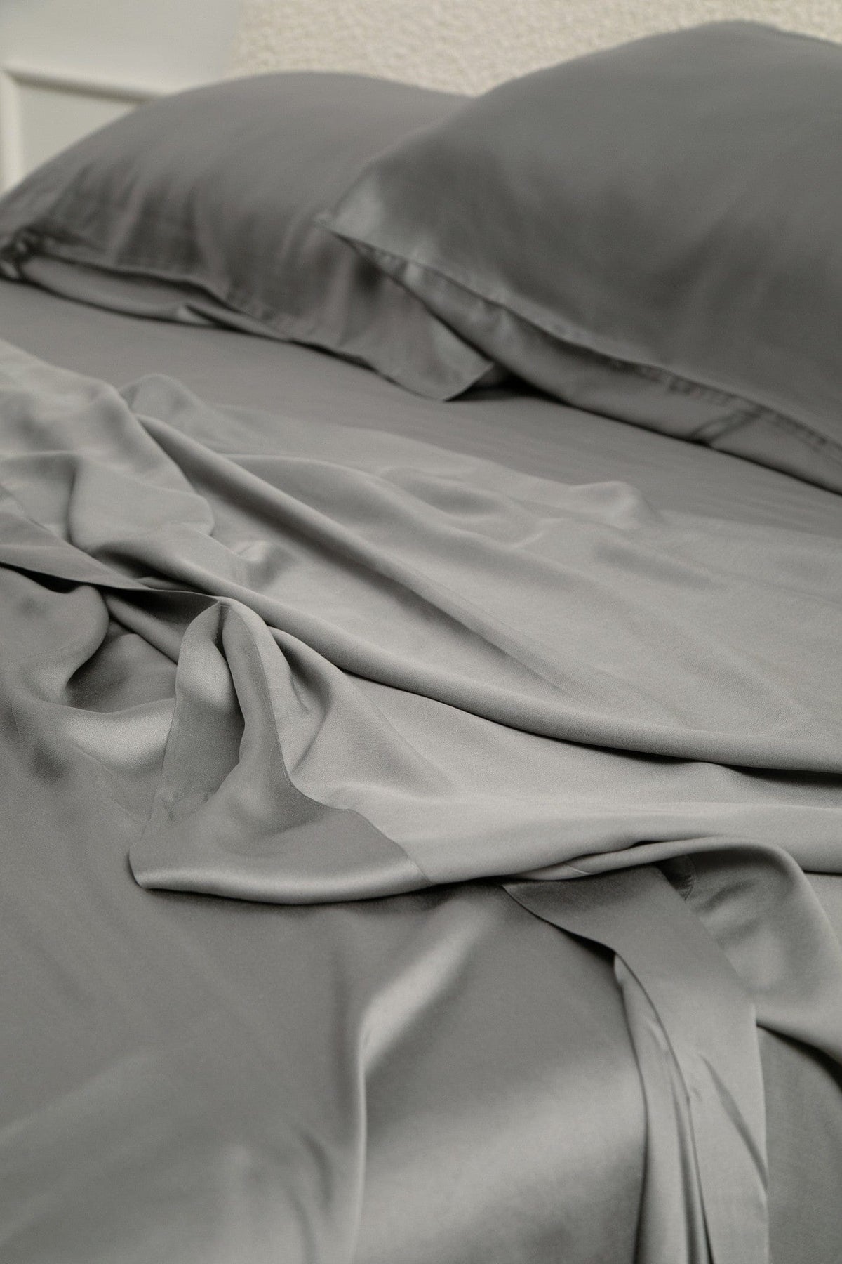 Bamboo Sateen Sheet Set in Ash shown on a bed