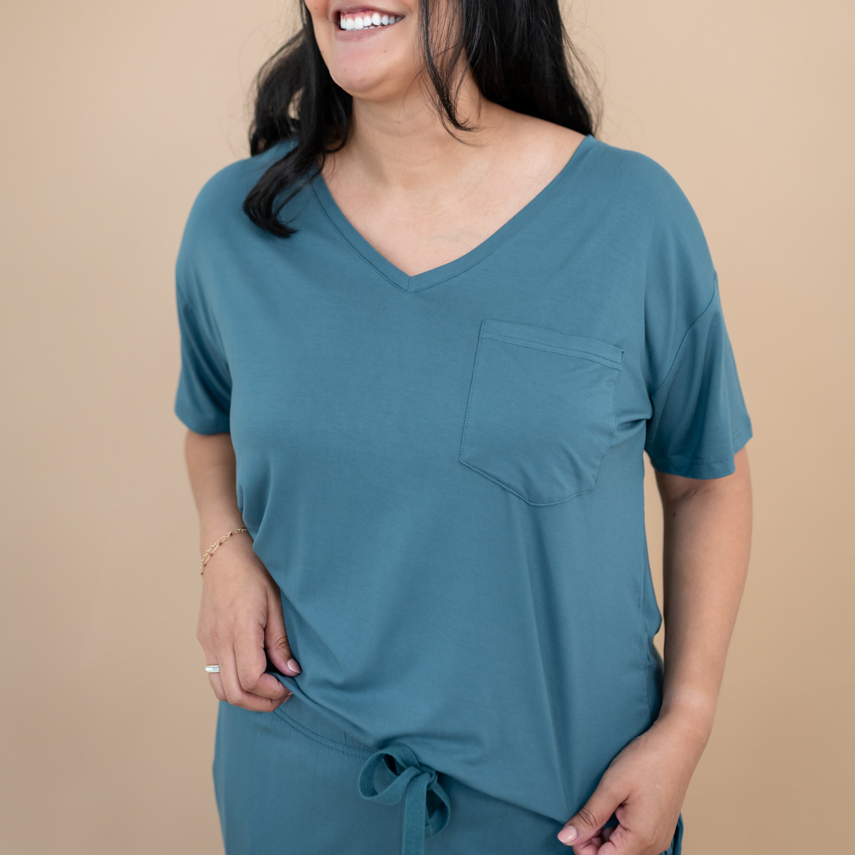 Close up of the Women’s Relaxed Fit V-Neck in Atlantic on model