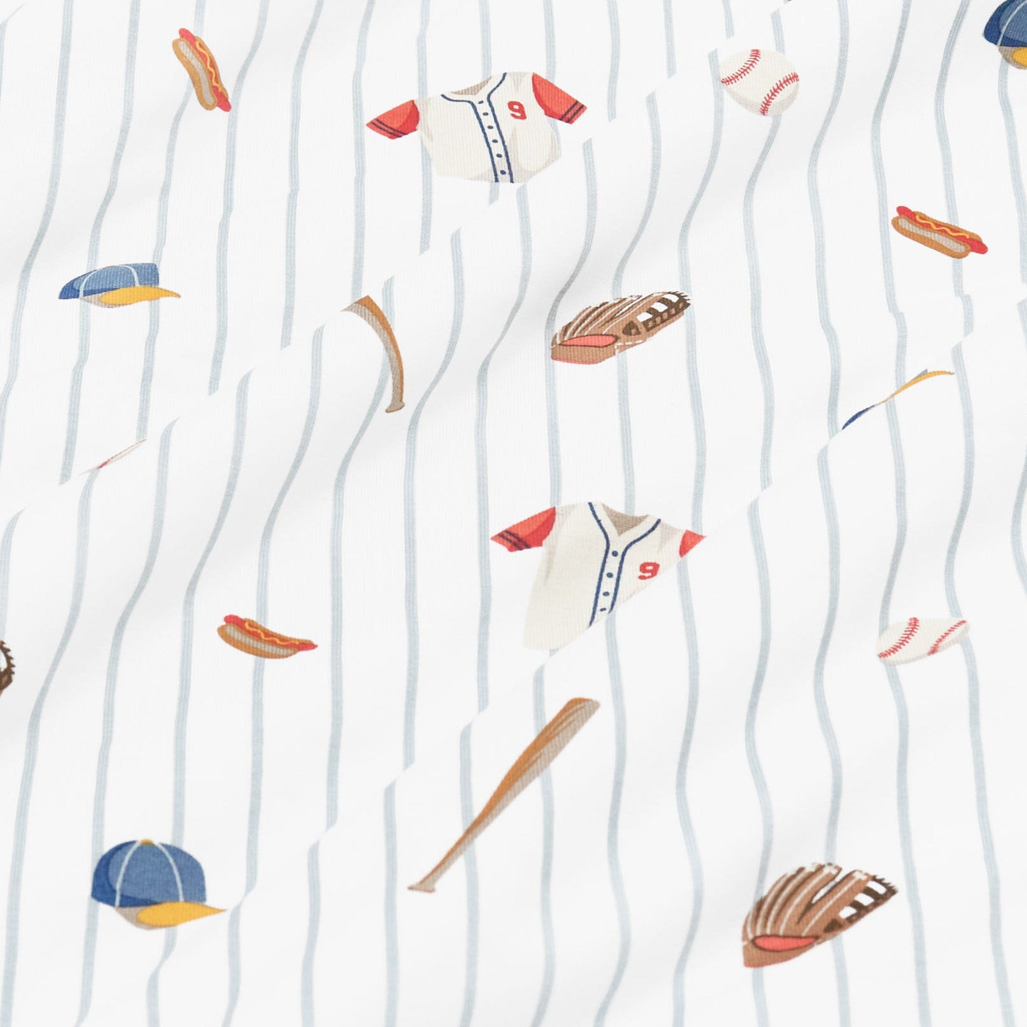 Close up of the fabric showing the baseball print