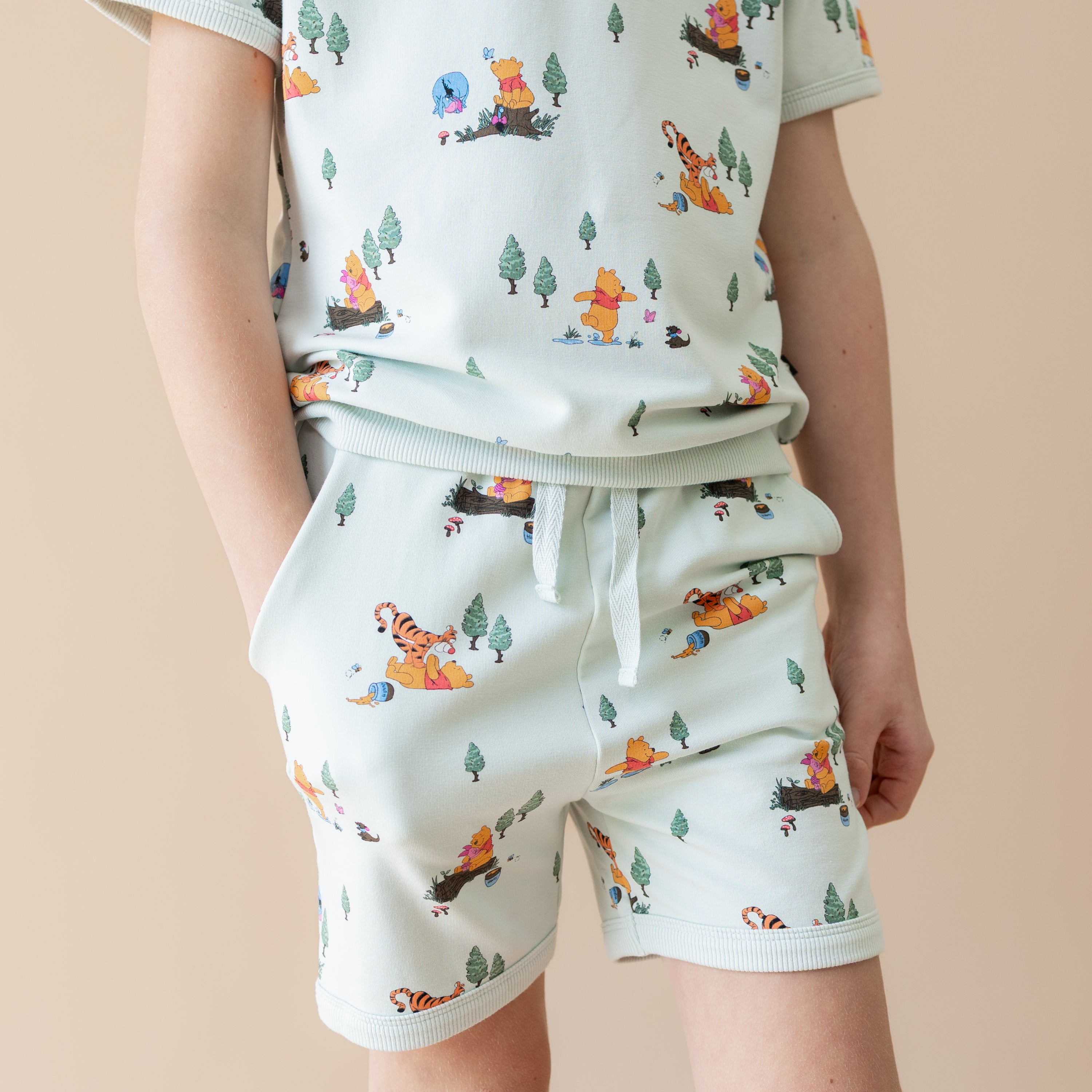 Close up of the shorts on the Short Sleeve Jogger Set in Winnie the Pooh Hundred Acre Wood
