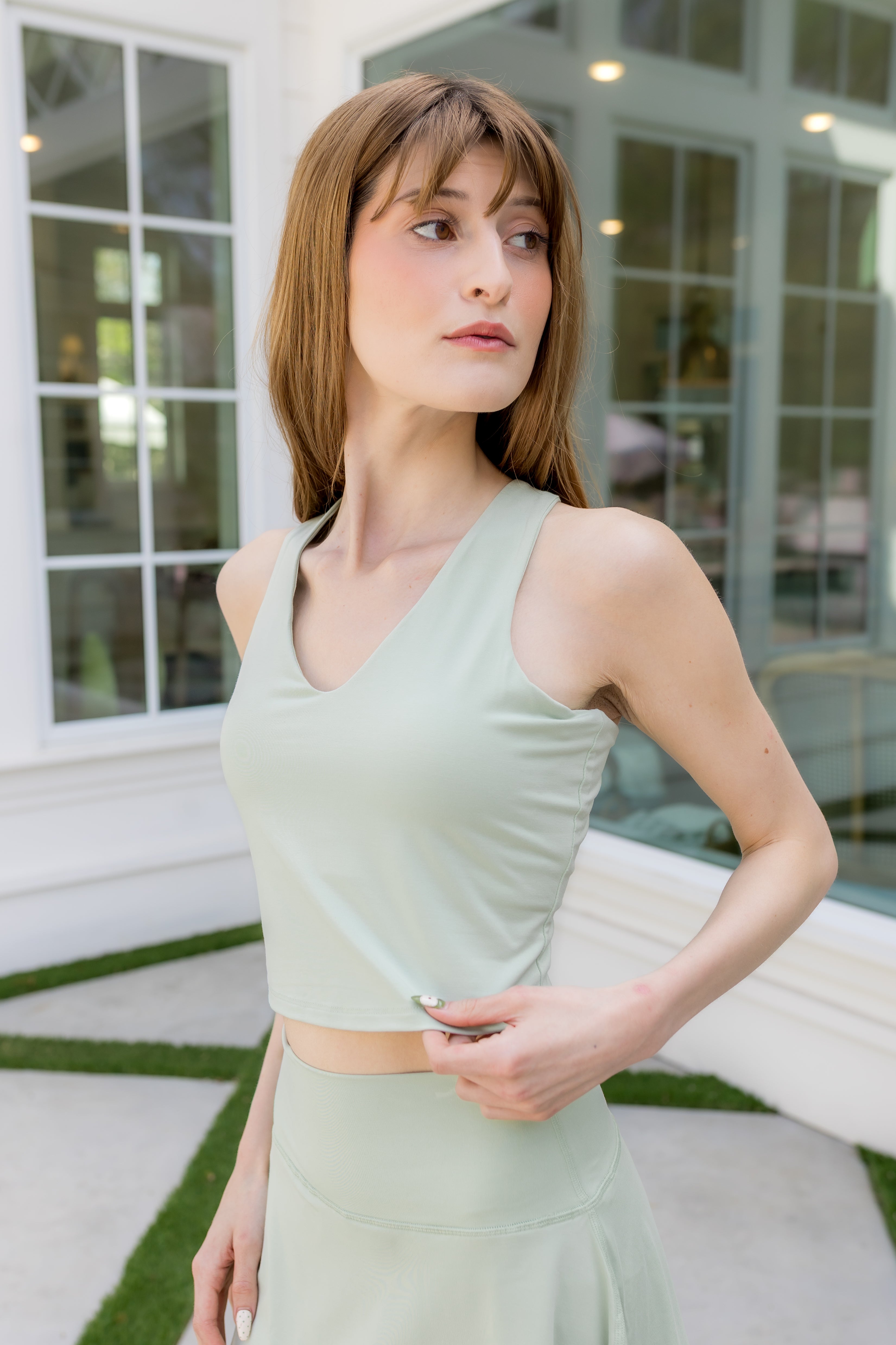 Female modeling the Bamboo Flex Bra Tank in Basil
