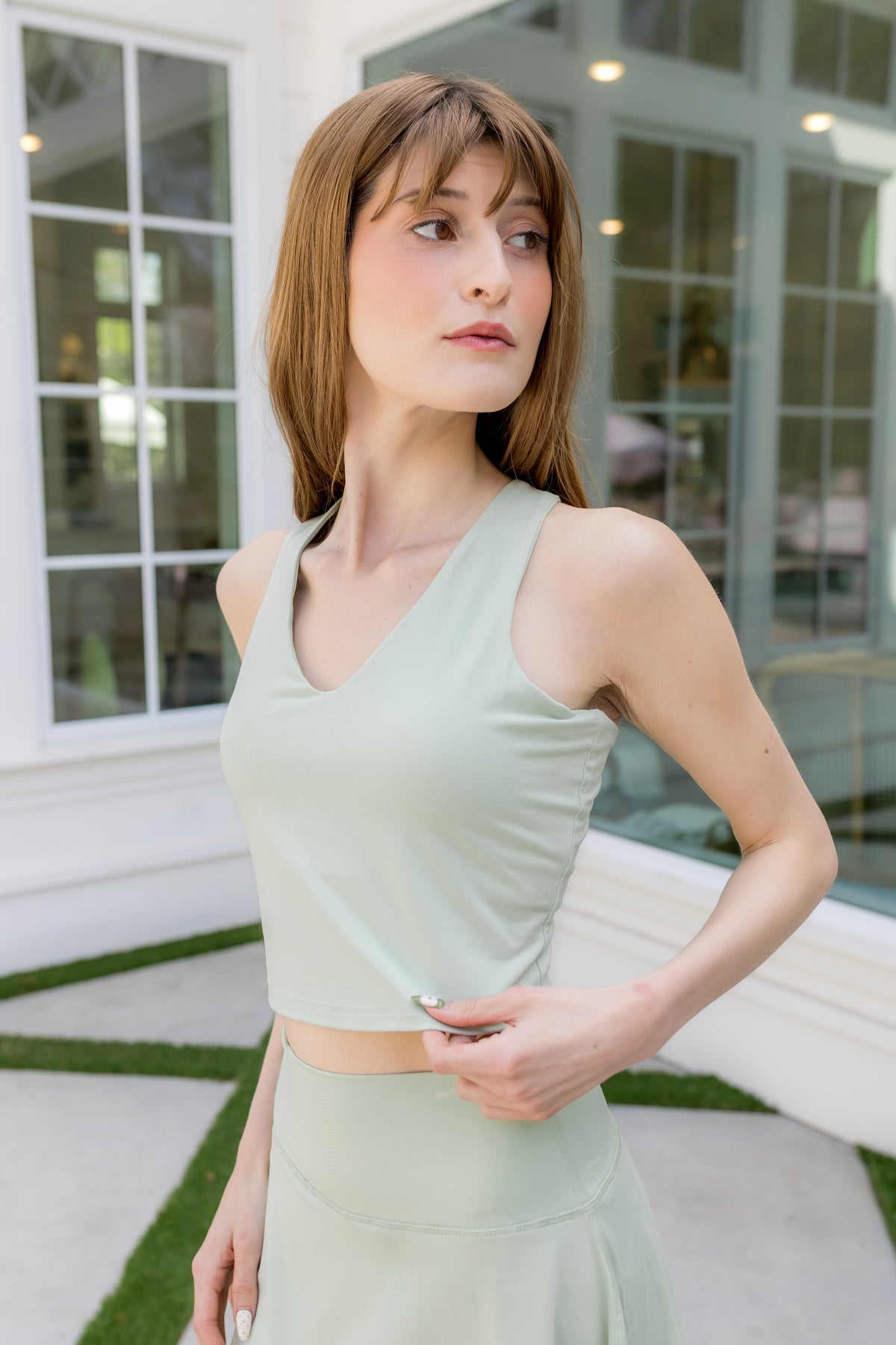 Female modeling the Bamboo Flex Bra Tank in Basil