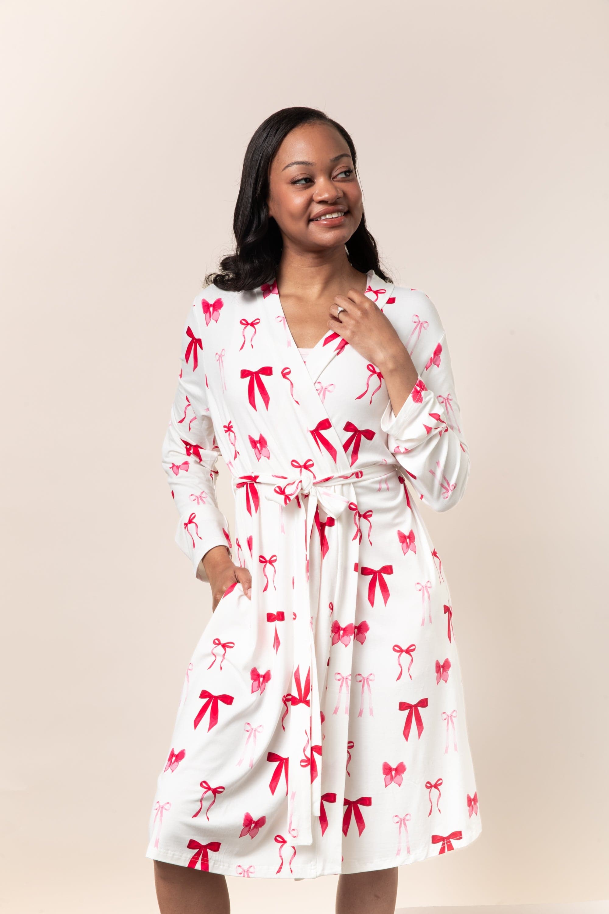 Model wearing the Bamboo Women's Lounge Robe in Big Love Bow