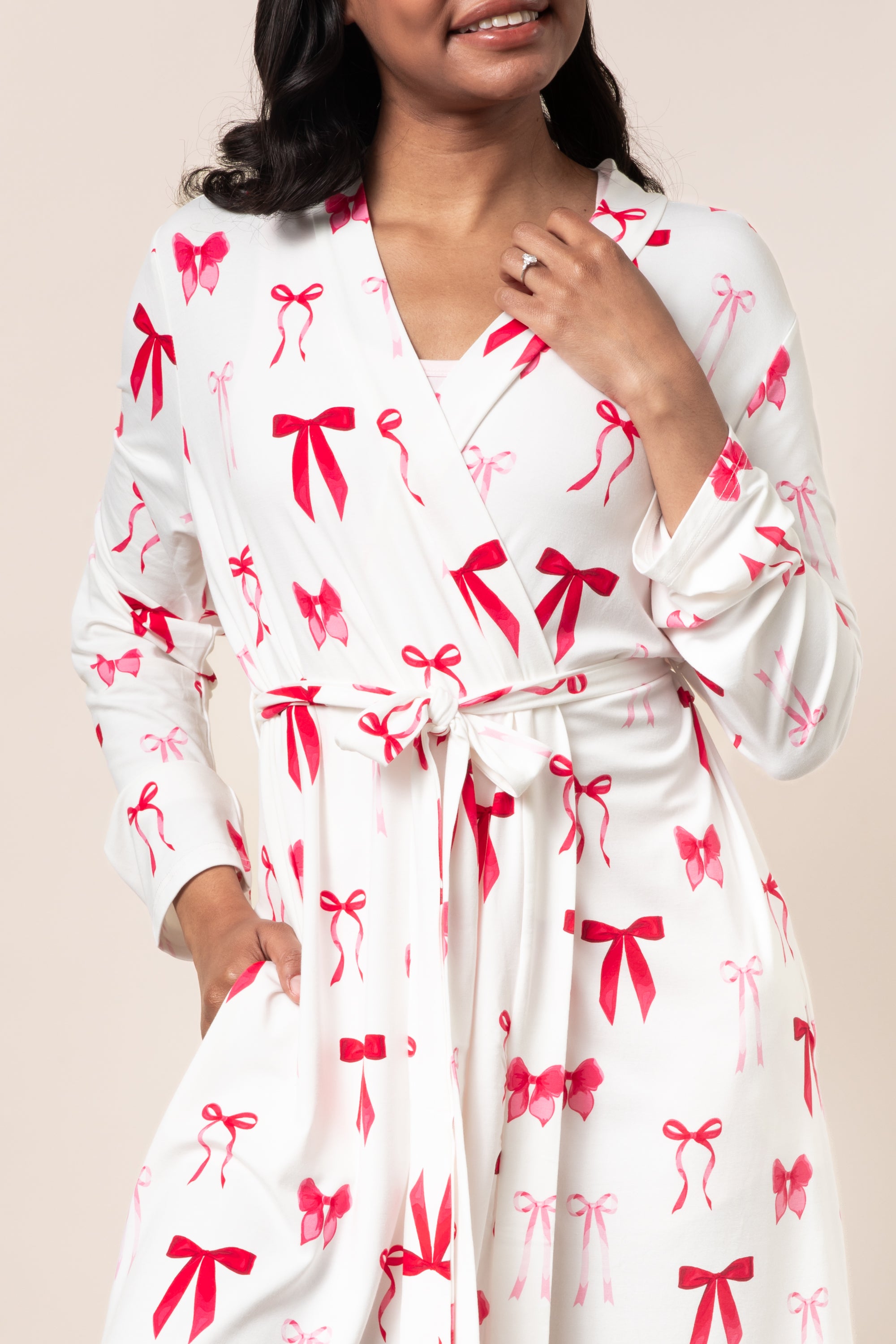Close up of the Women's Lounge Robe in Big Love Bow tied at the waist shown on a model