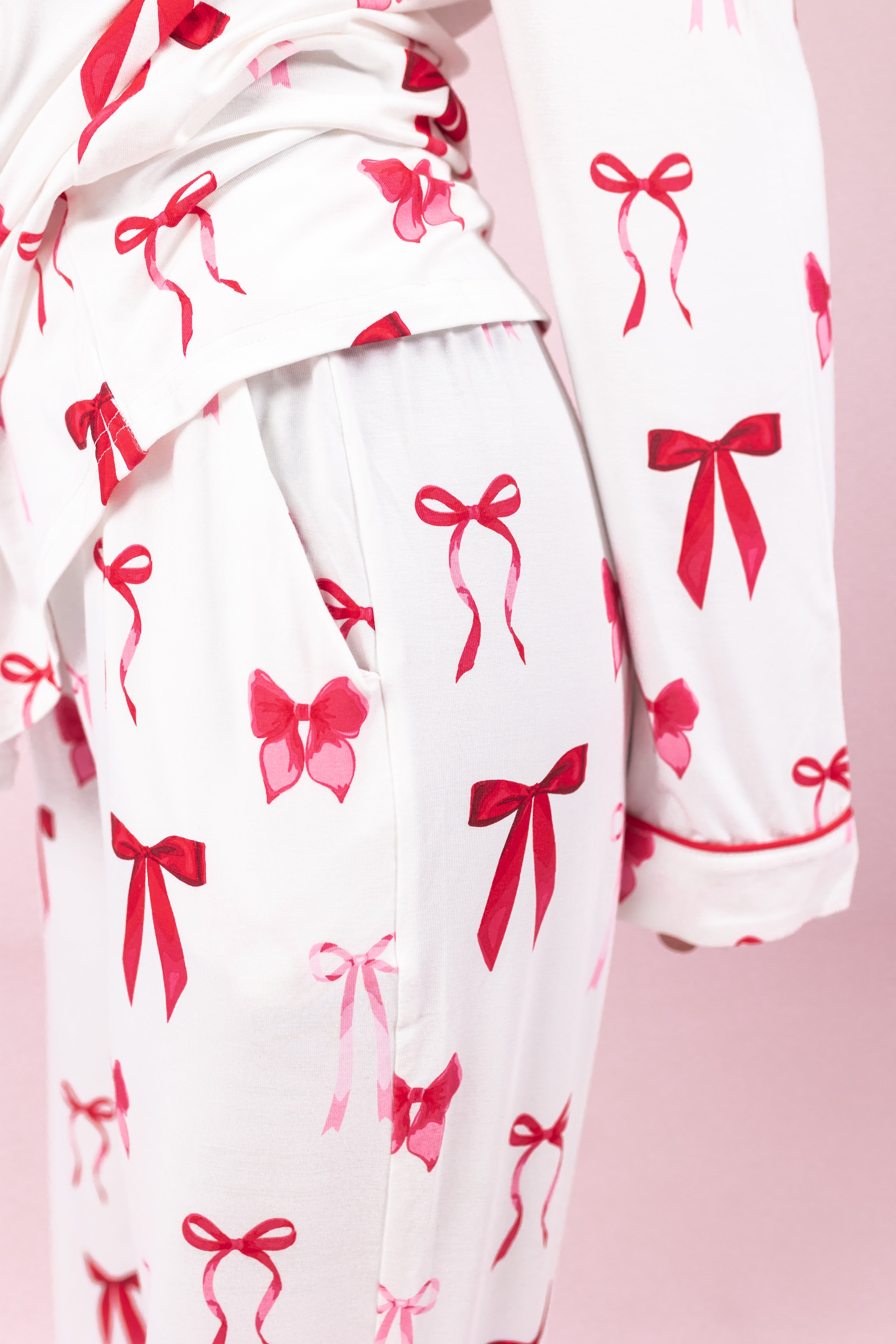 The pocket detail on the pants of the Long-Sleeved Women's Pajama Set in Big Love Bow shown on a model