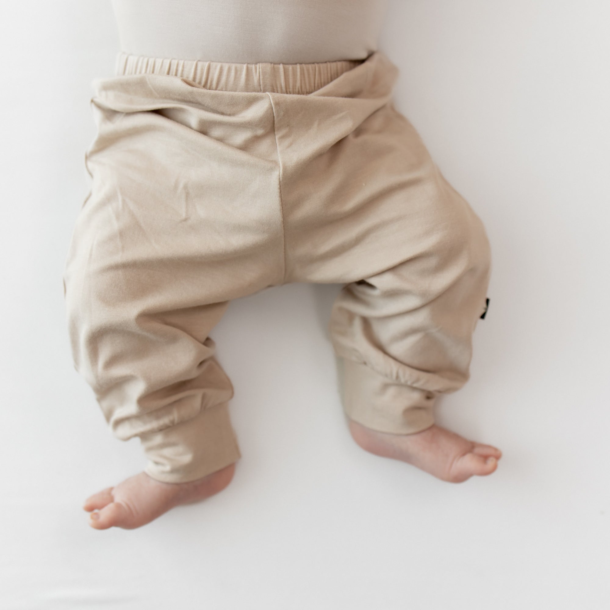 Close up of the Pant in Bisque on an infant