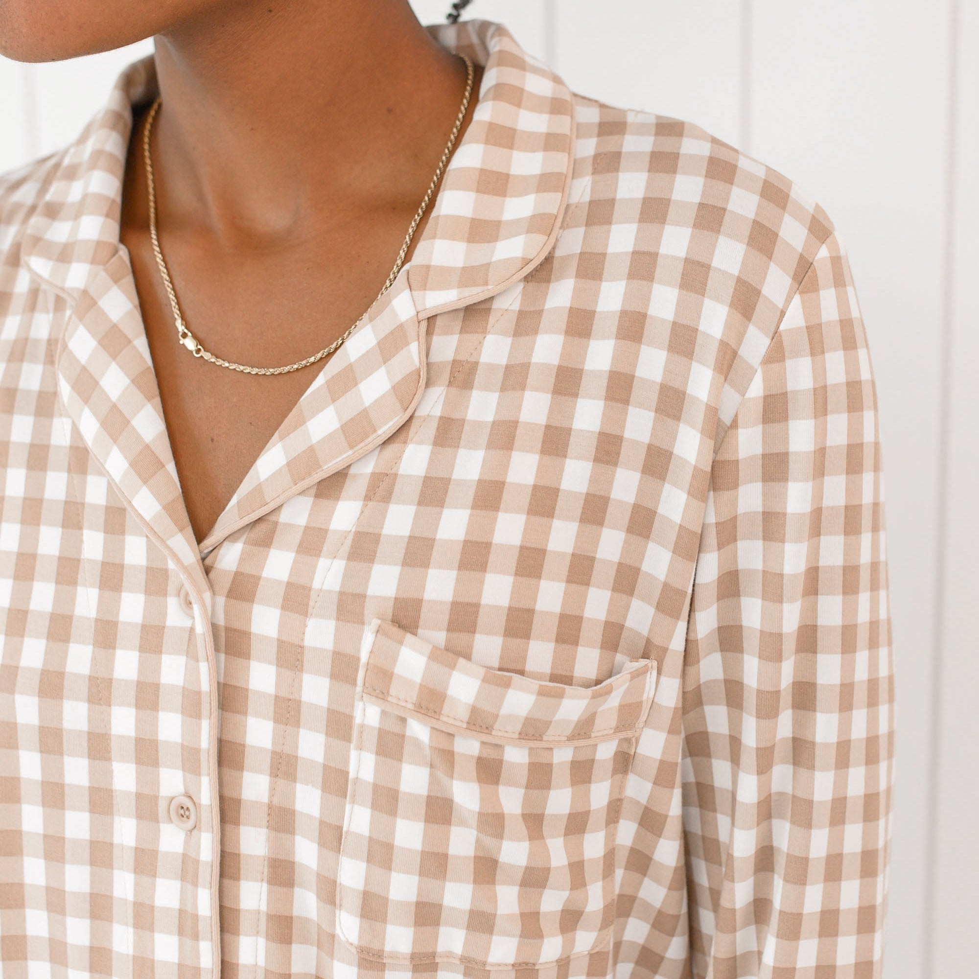Close up of the chest pocket detail on the Top of the Long-Sleeved Women's Pajama Set in Gingham Bisque