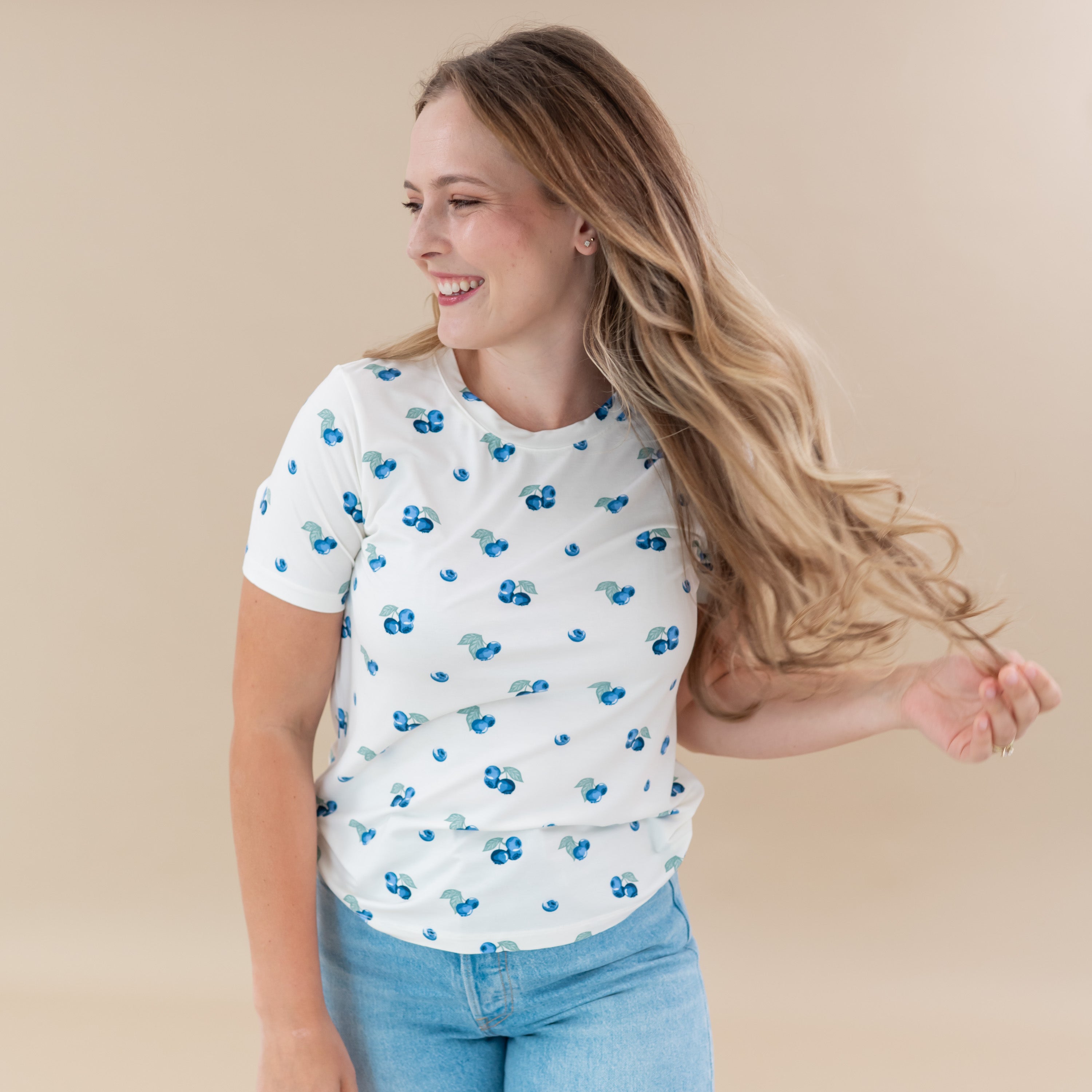Woman modeling Women's Crew Neck Tee in Blueberry