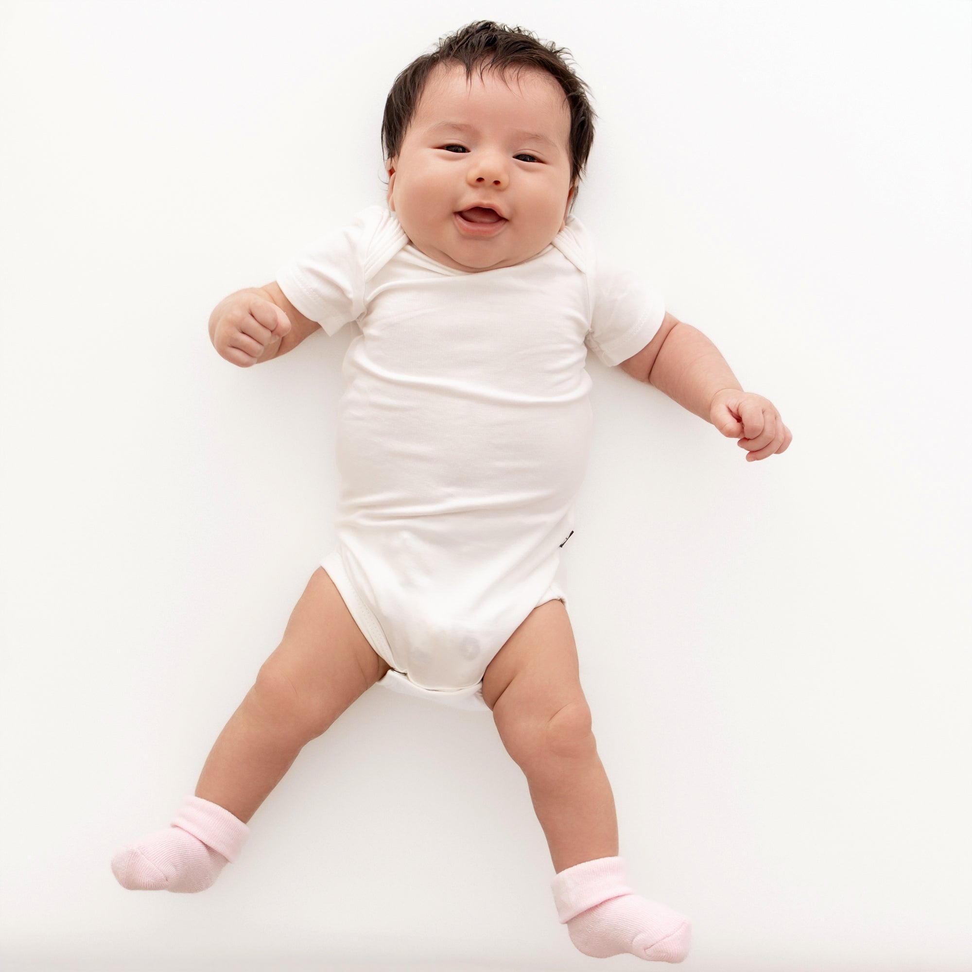 Baby wearing Sakura pink infant socks