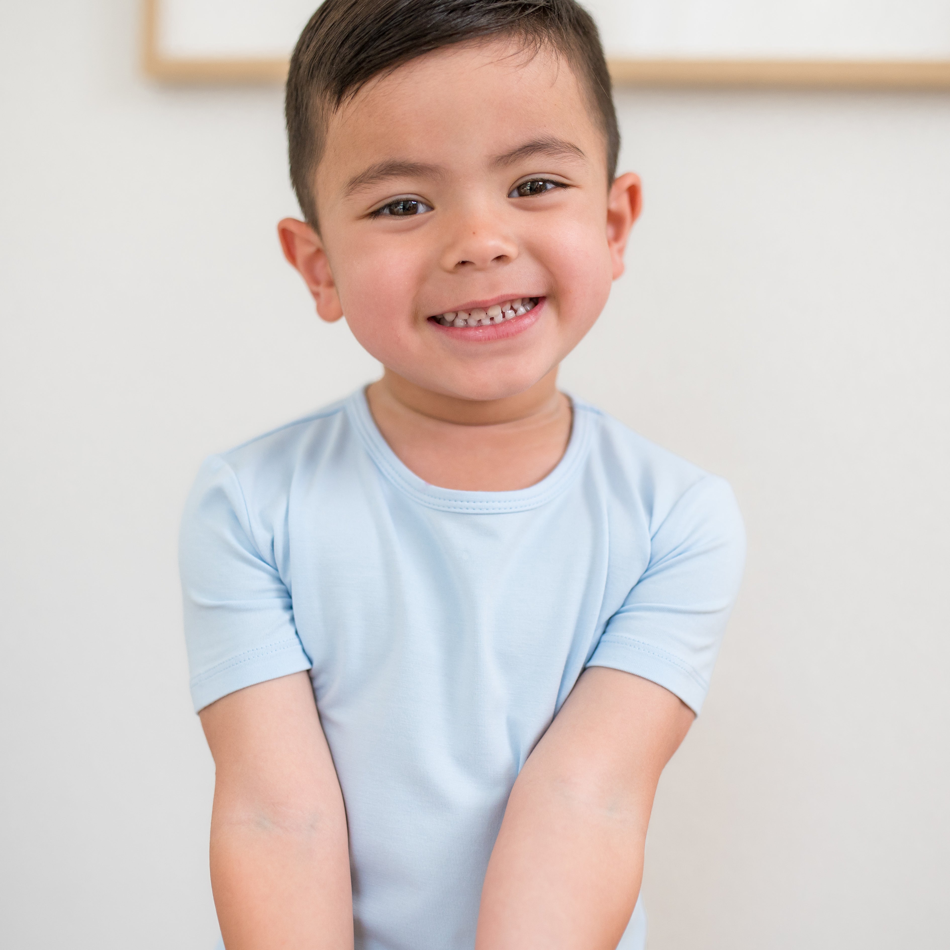Close up of the shirt on the Short Sleeve Pajamas in Breeze shown on a young boy model
