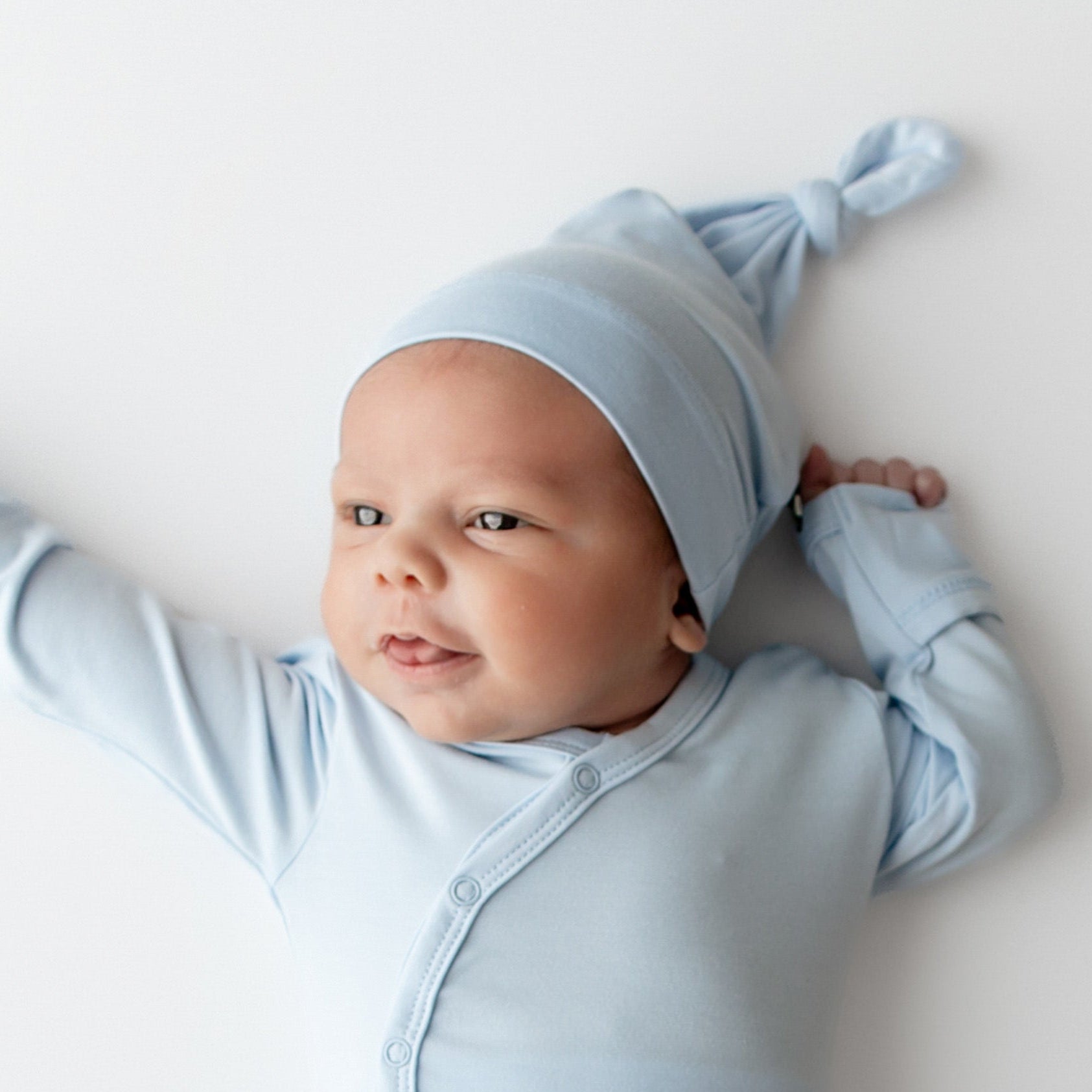 Newborn wearing the Knotted Cap in Breeze