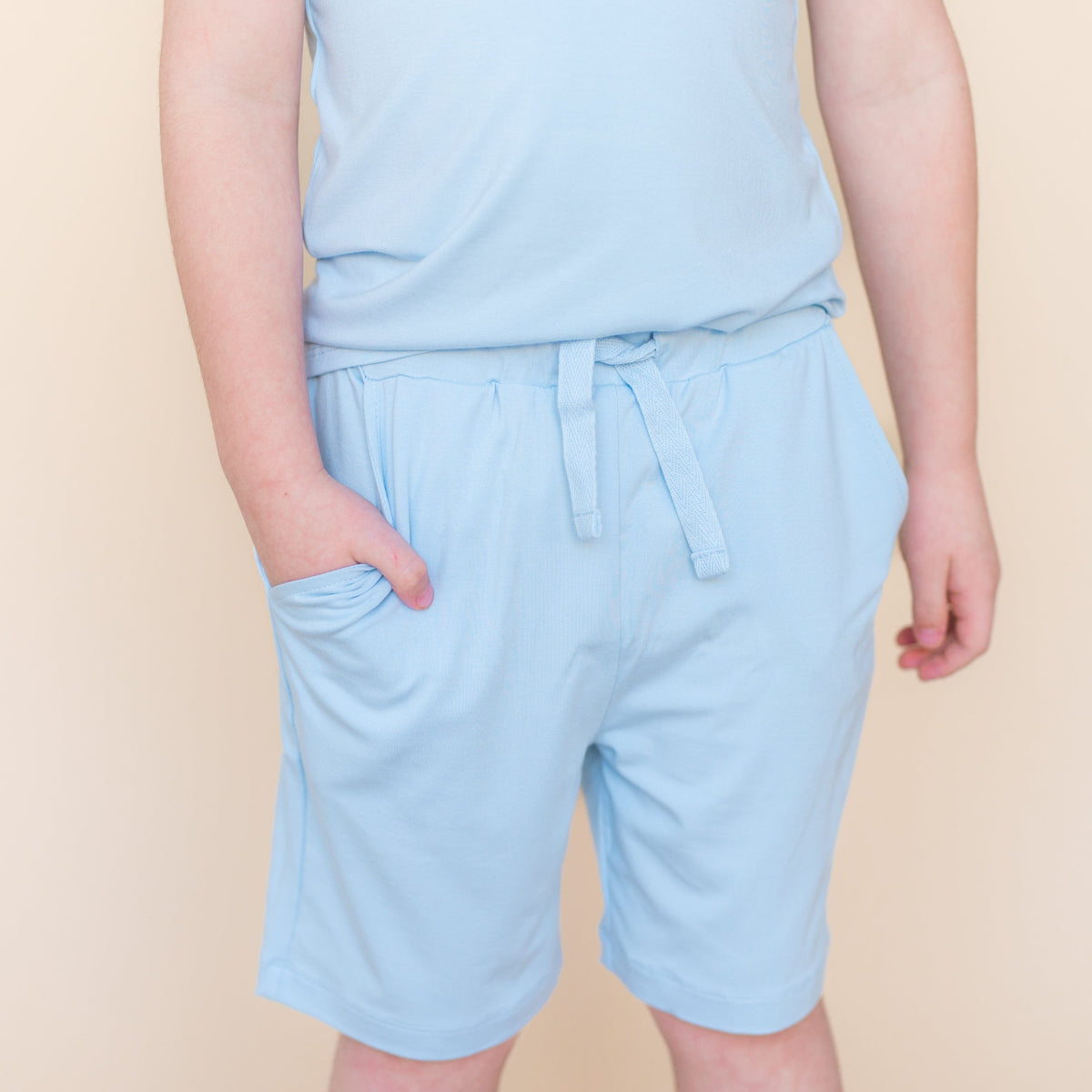 Close up of the Drawstring Short in Breeze shown on a young model