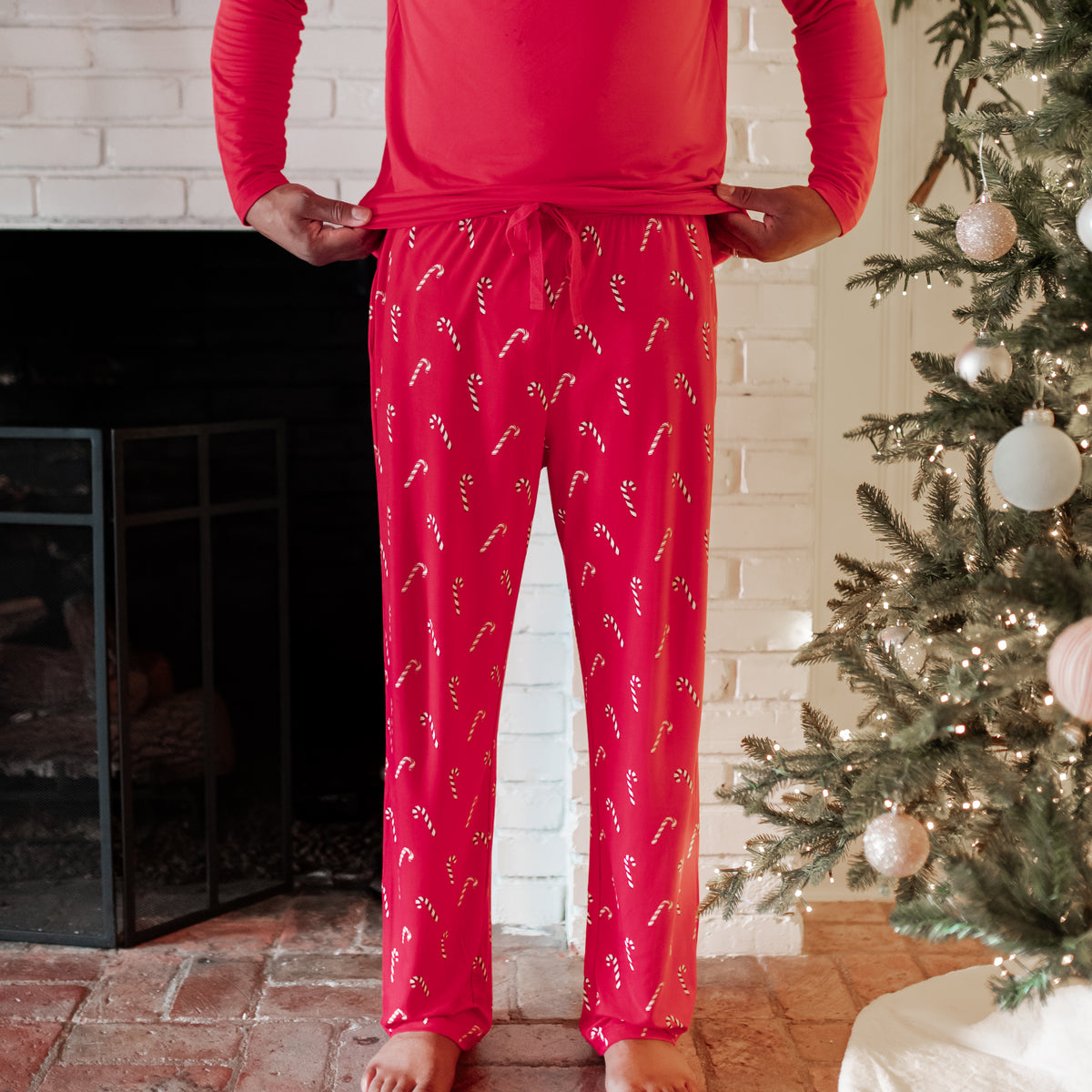 Men's Lounge Pants in Candy Cane shown on a male model