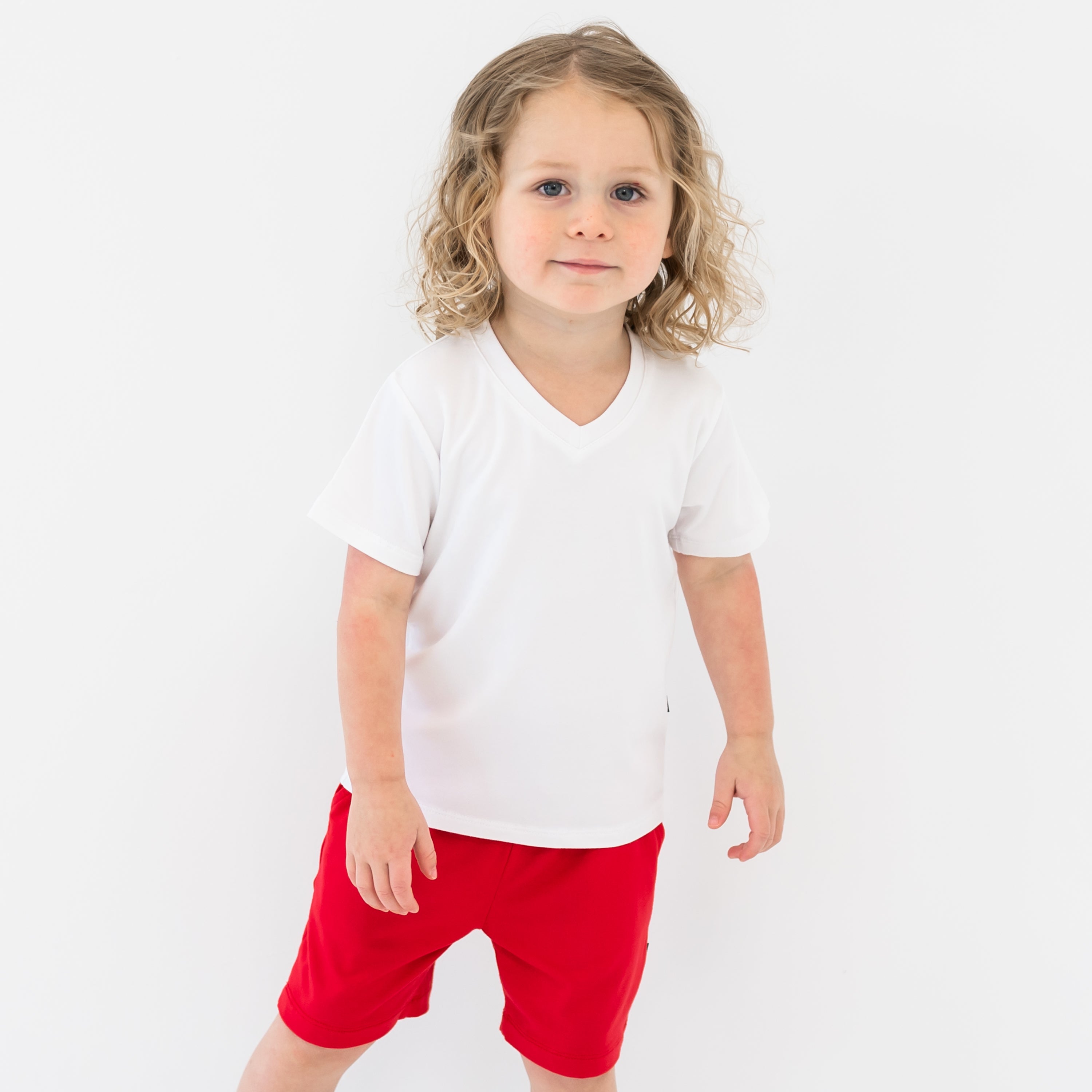 Toddler modeling Drawstring Short in Cardinal and Snow V-neck