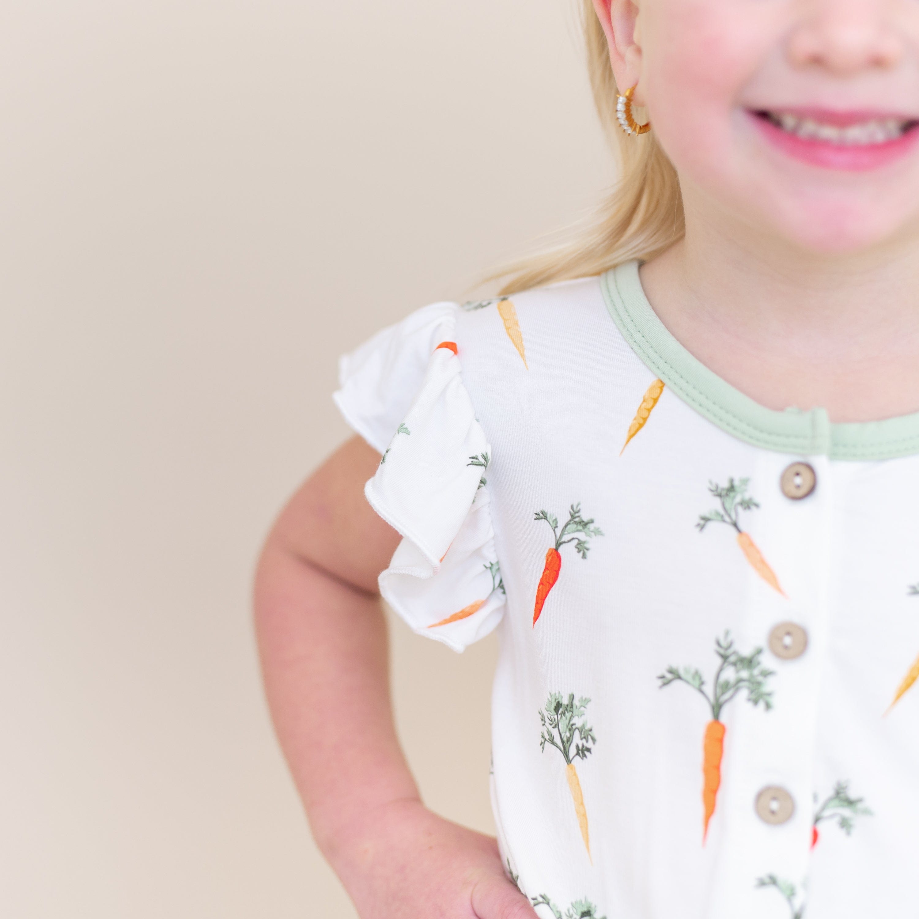Close up of the flutter sleeve on the Flutter Sleeve Romper in Carrot
