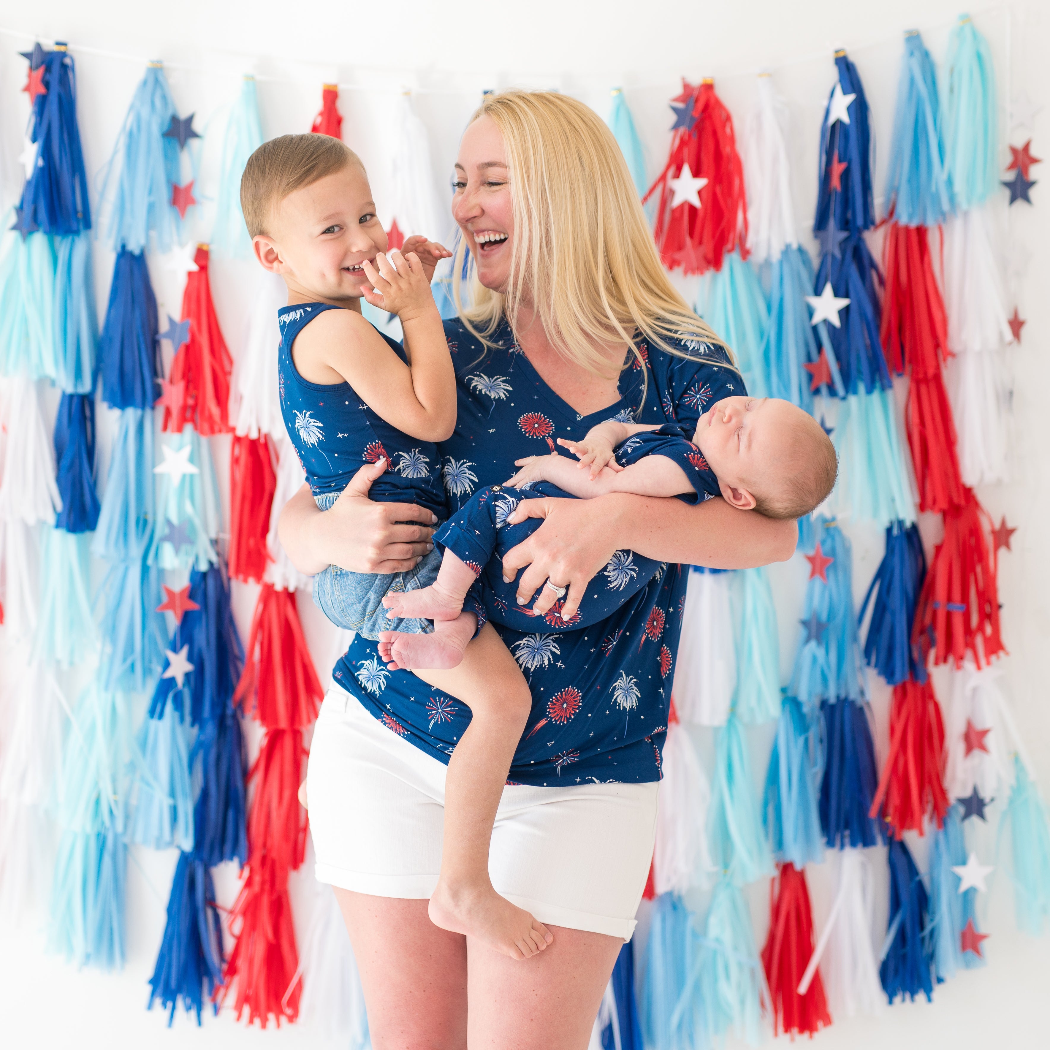 Family matching in the Celebration collection. Picured is the Zippered Sleeveless Romper, Toddler Tank and Women's Relaxed V-neck
