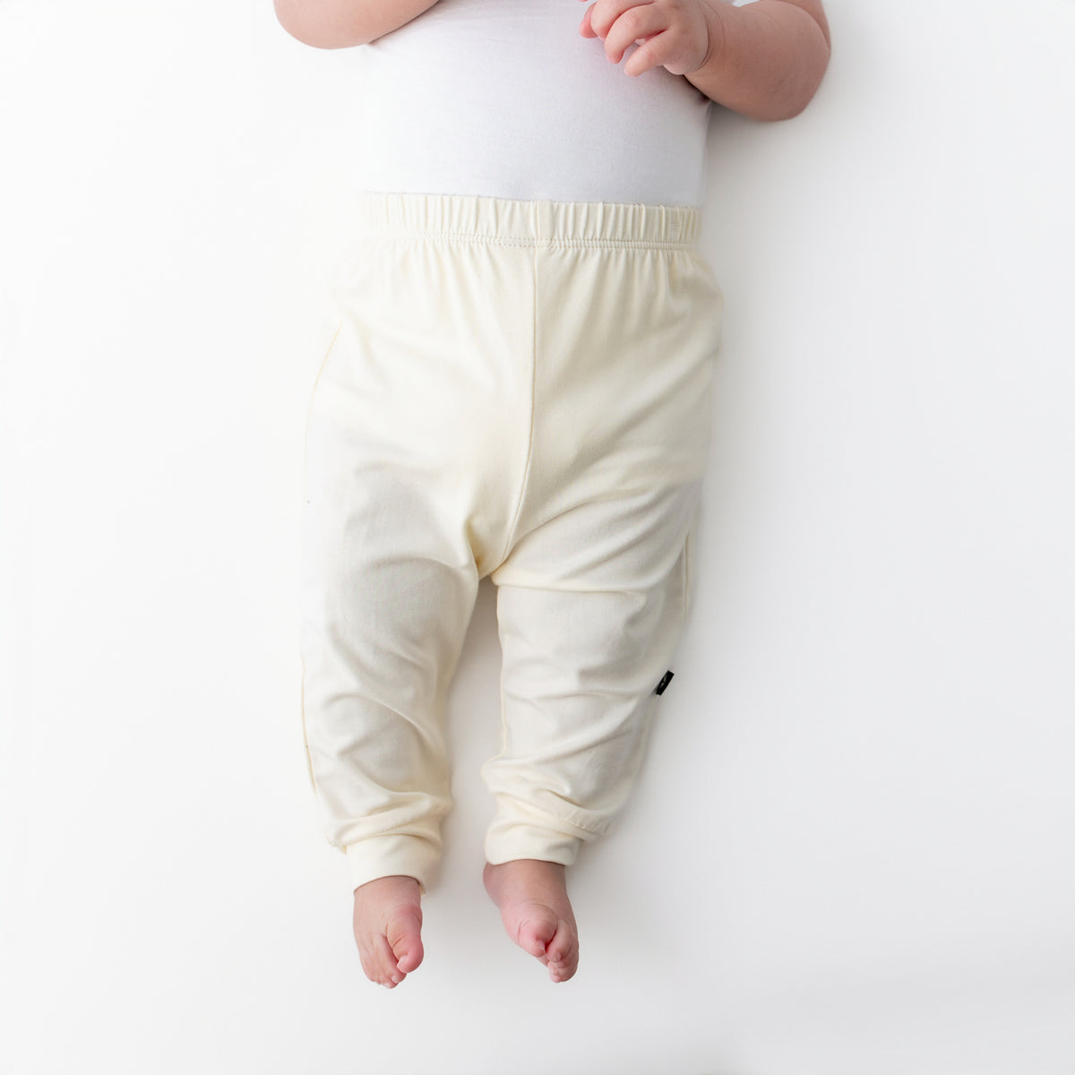 Pant in Chamomile shown on an infant model