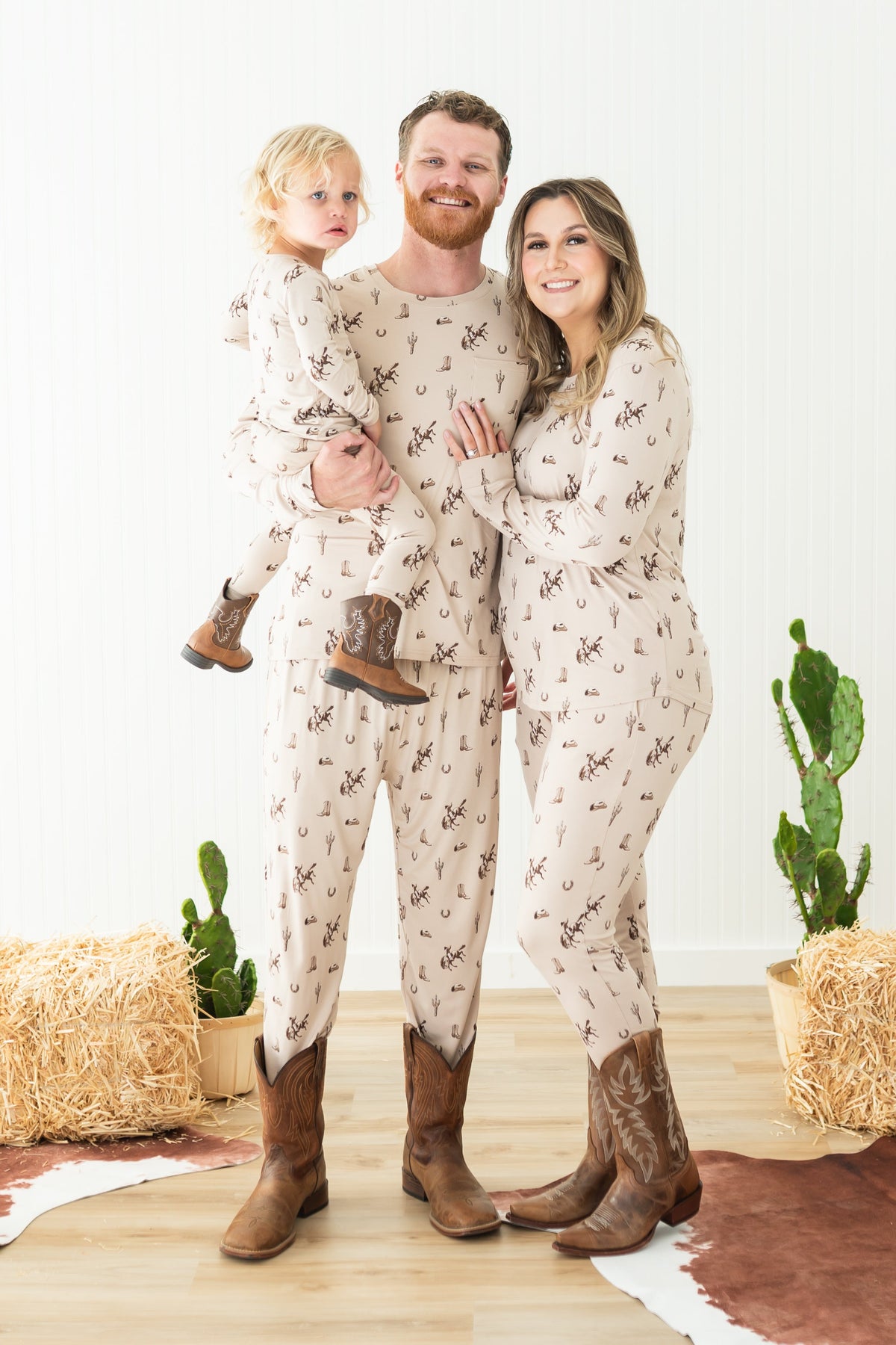 Family of three matching in Classic cowboy pajamas