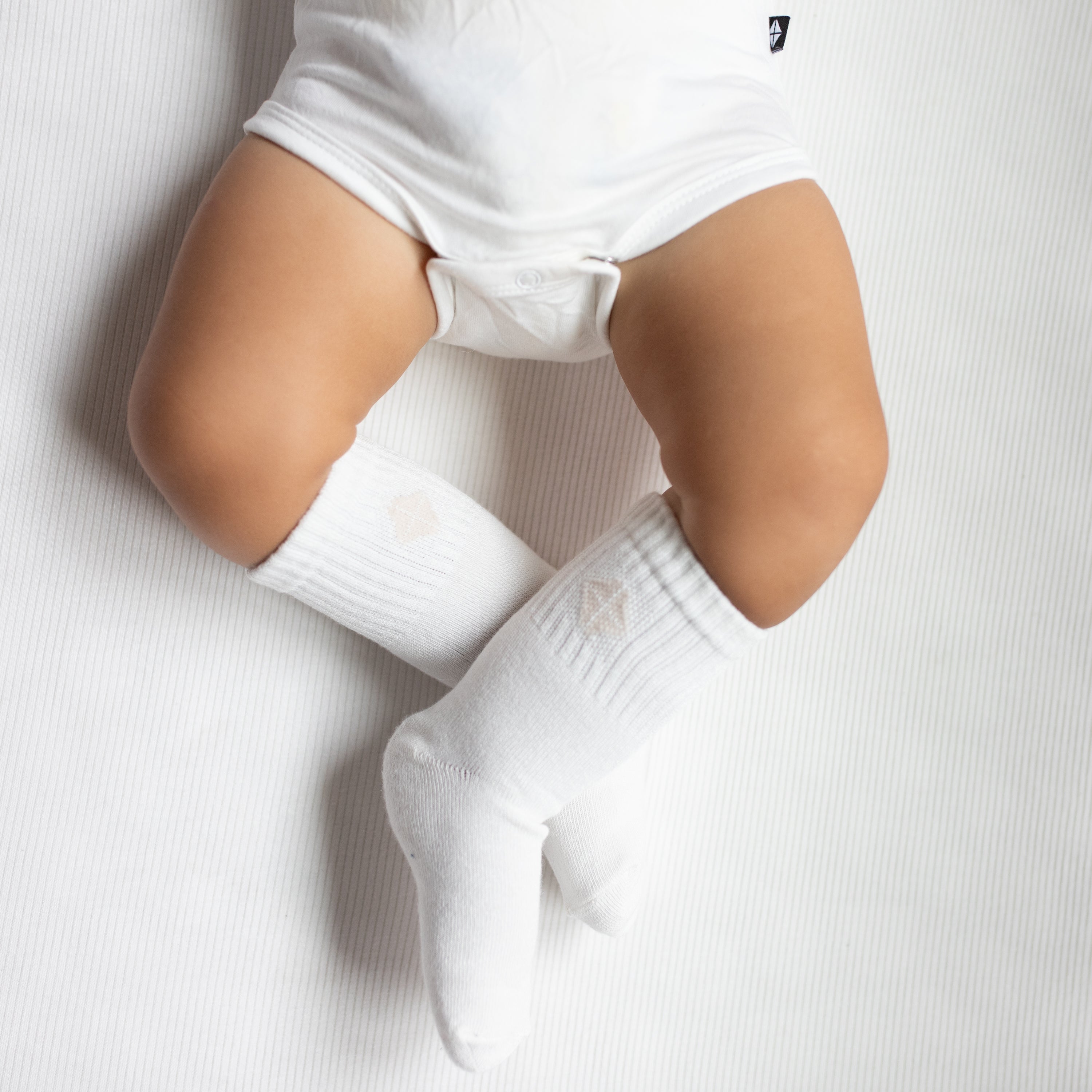 Crew Socks Combo 3-Pack in Cloud shown on a baby model