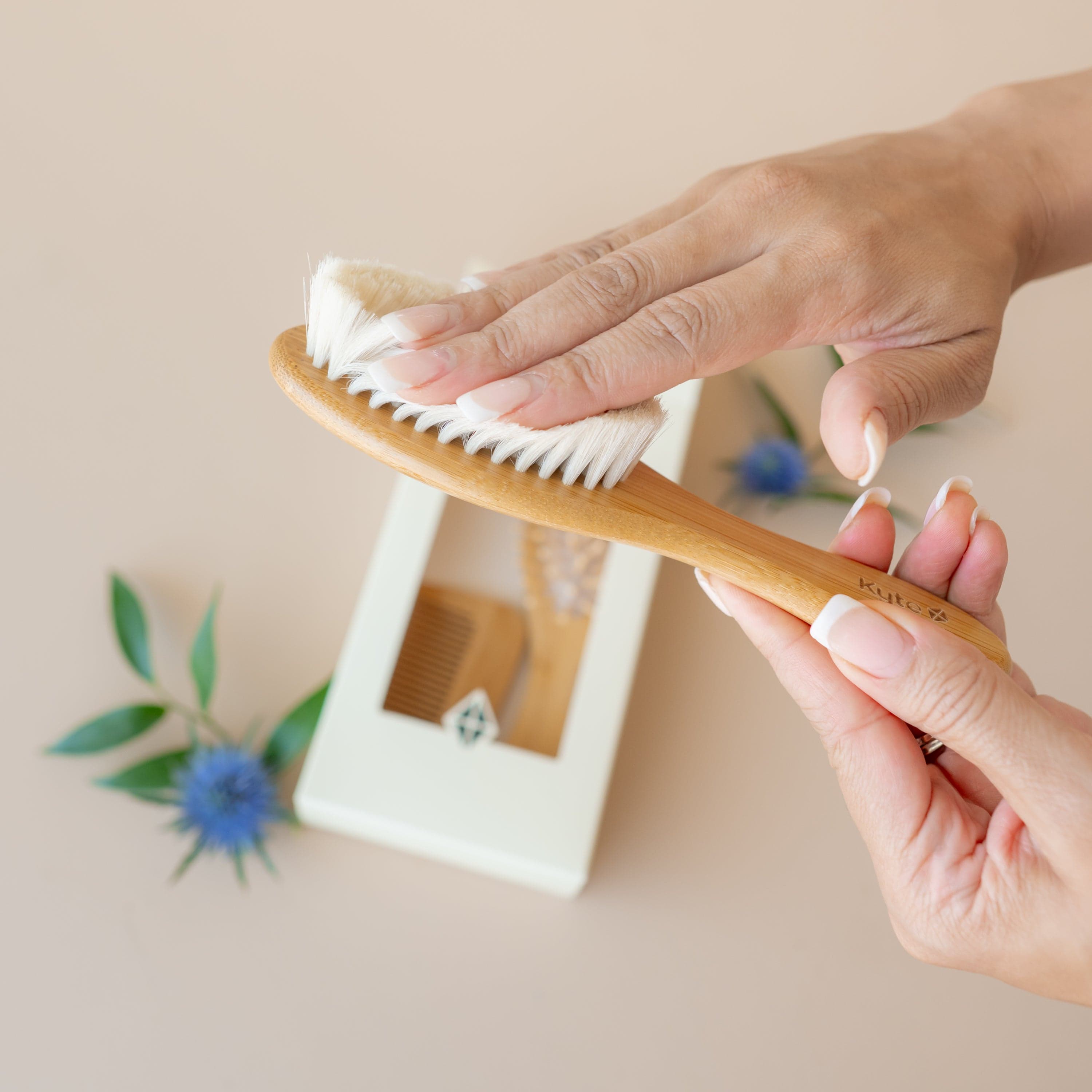 Close up of the cradle cap brush showing the softness and flexibility of the goat hair bristles