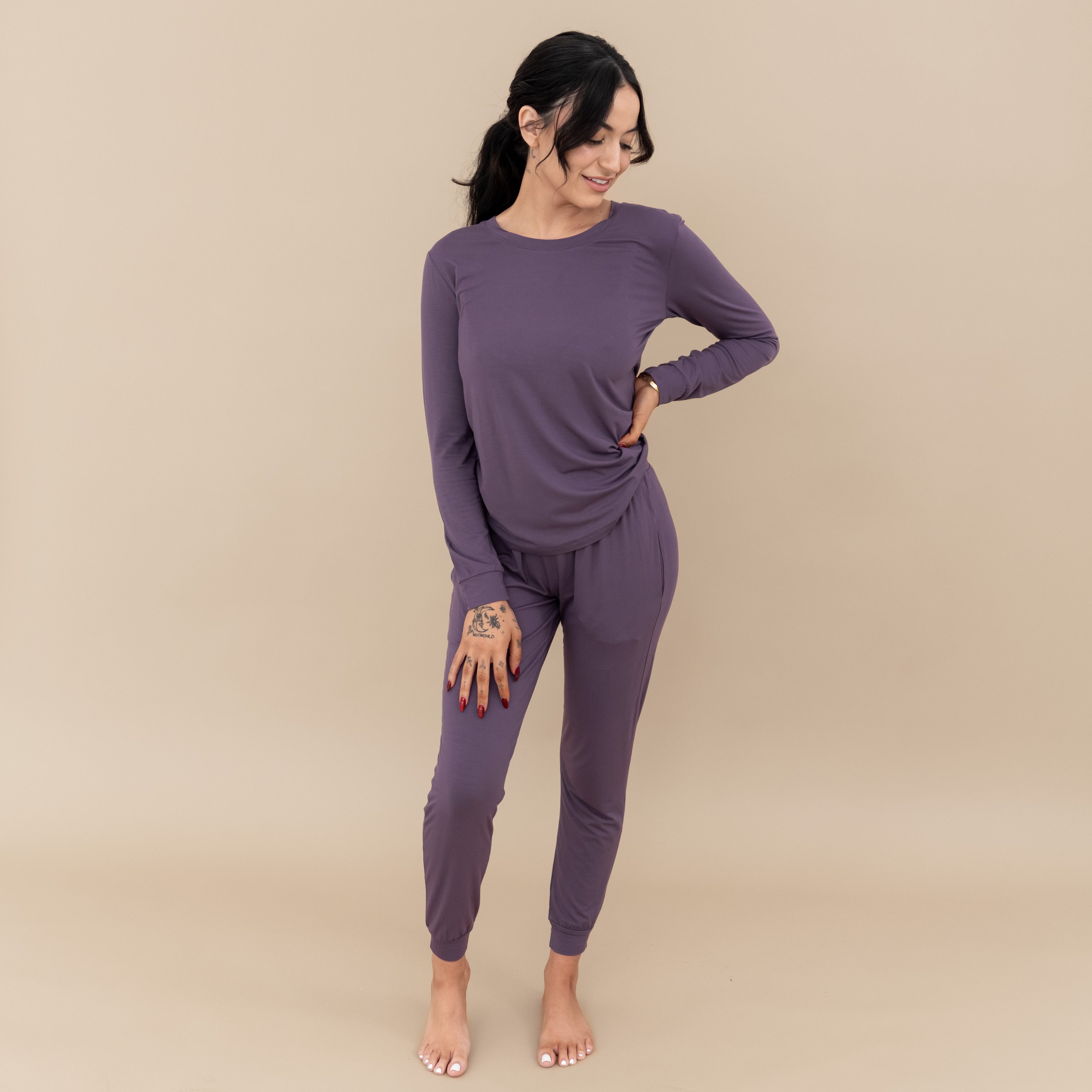Woman modeling Women's Jogger Pajama Set in Currant