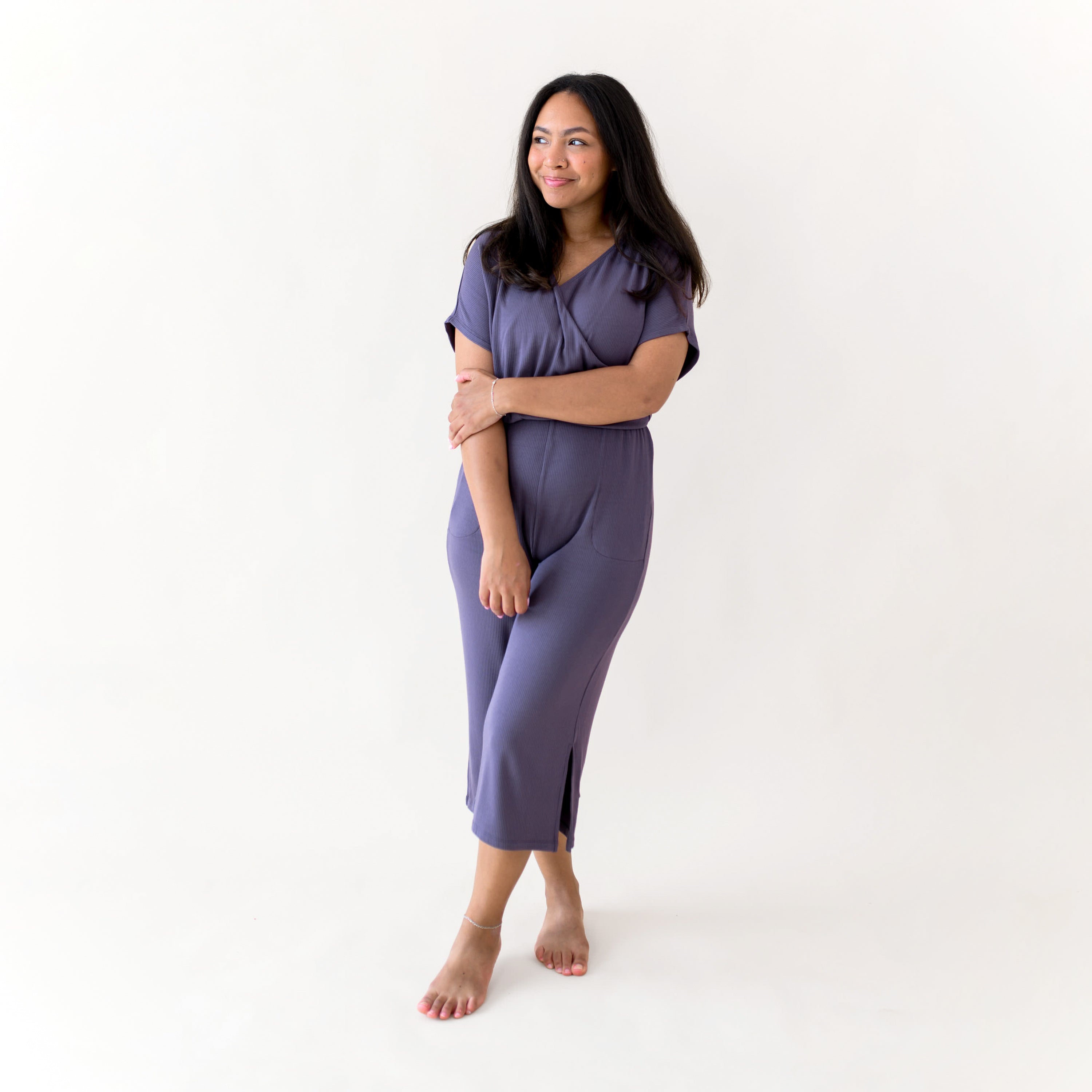 Woman modeling Women's Ribbed Jumpsuit in Currant