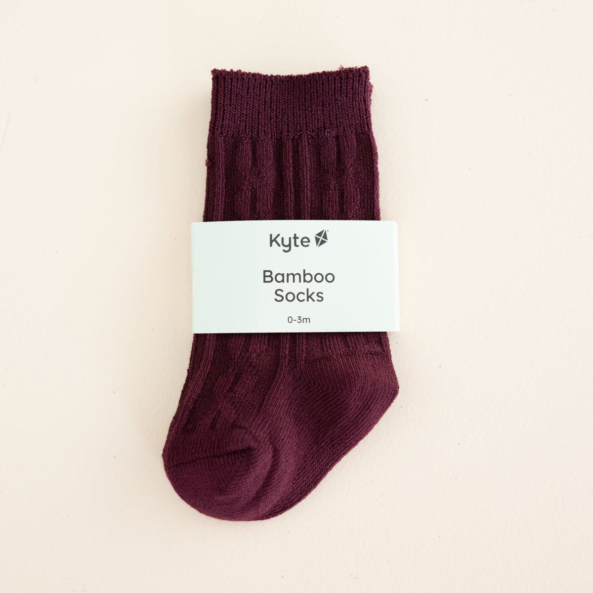 Knee High Socks in Burgundy shown in its packaging