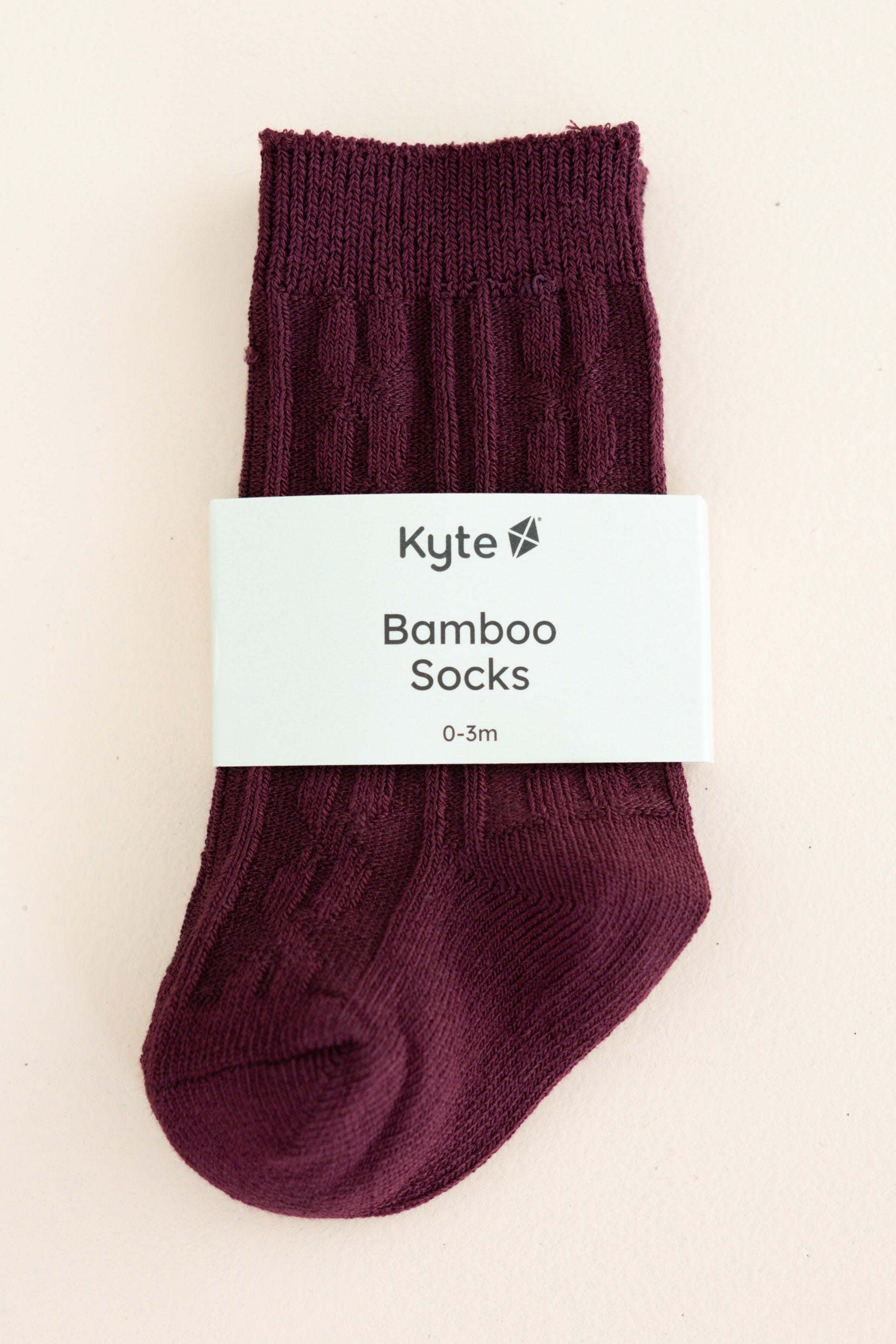 Knee High Socks in Burgundy shown in its packaging