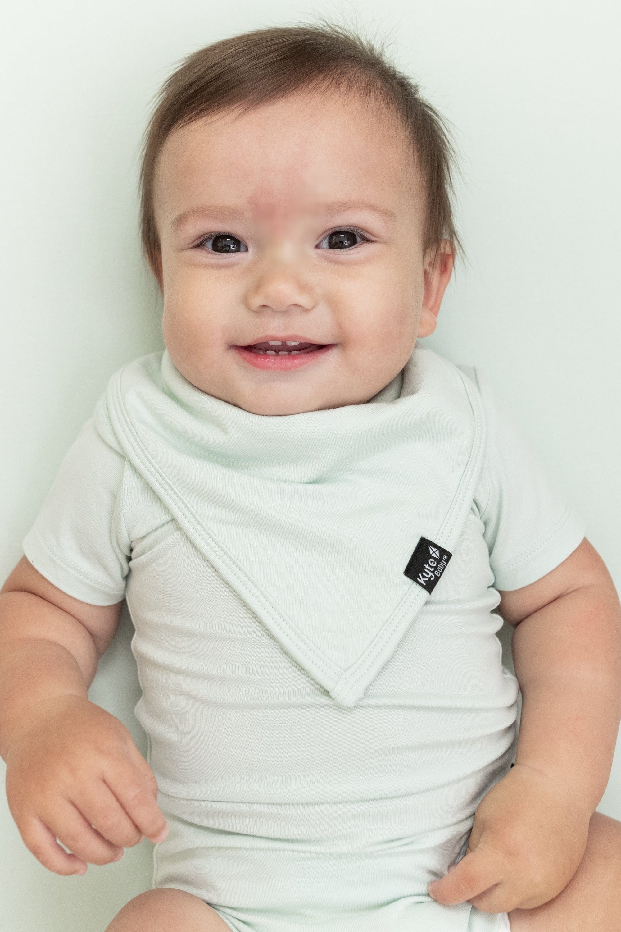 Infant wearing the Bib in Dew with matching Short Sleeve Bodysuit in Dew