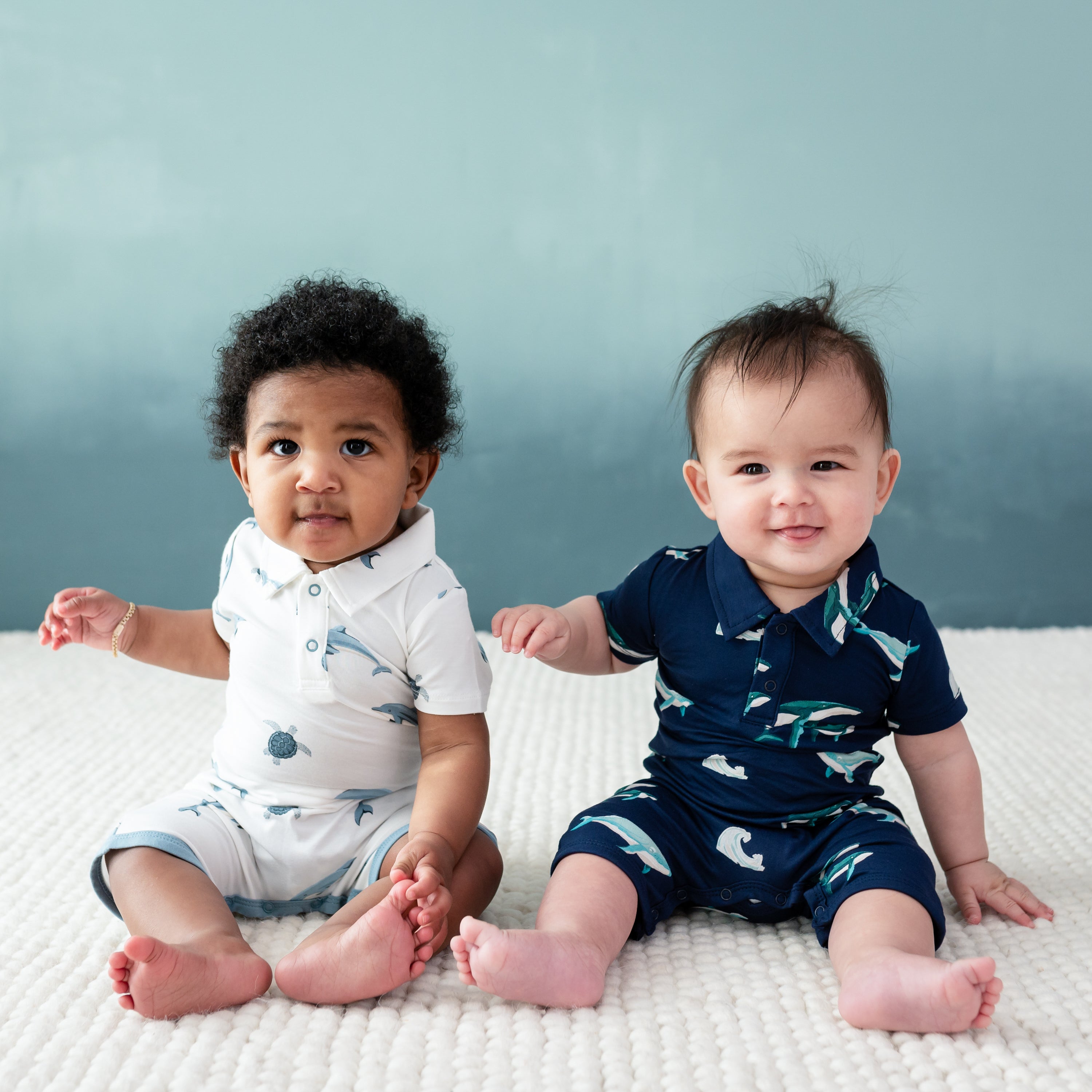 Babies wearing Polo Shortalls in Dolphin and Humpback