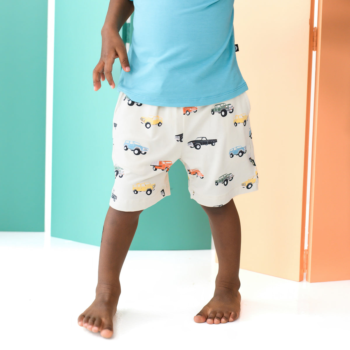 Child wearing Drawstring Shorts in Vintage Truck