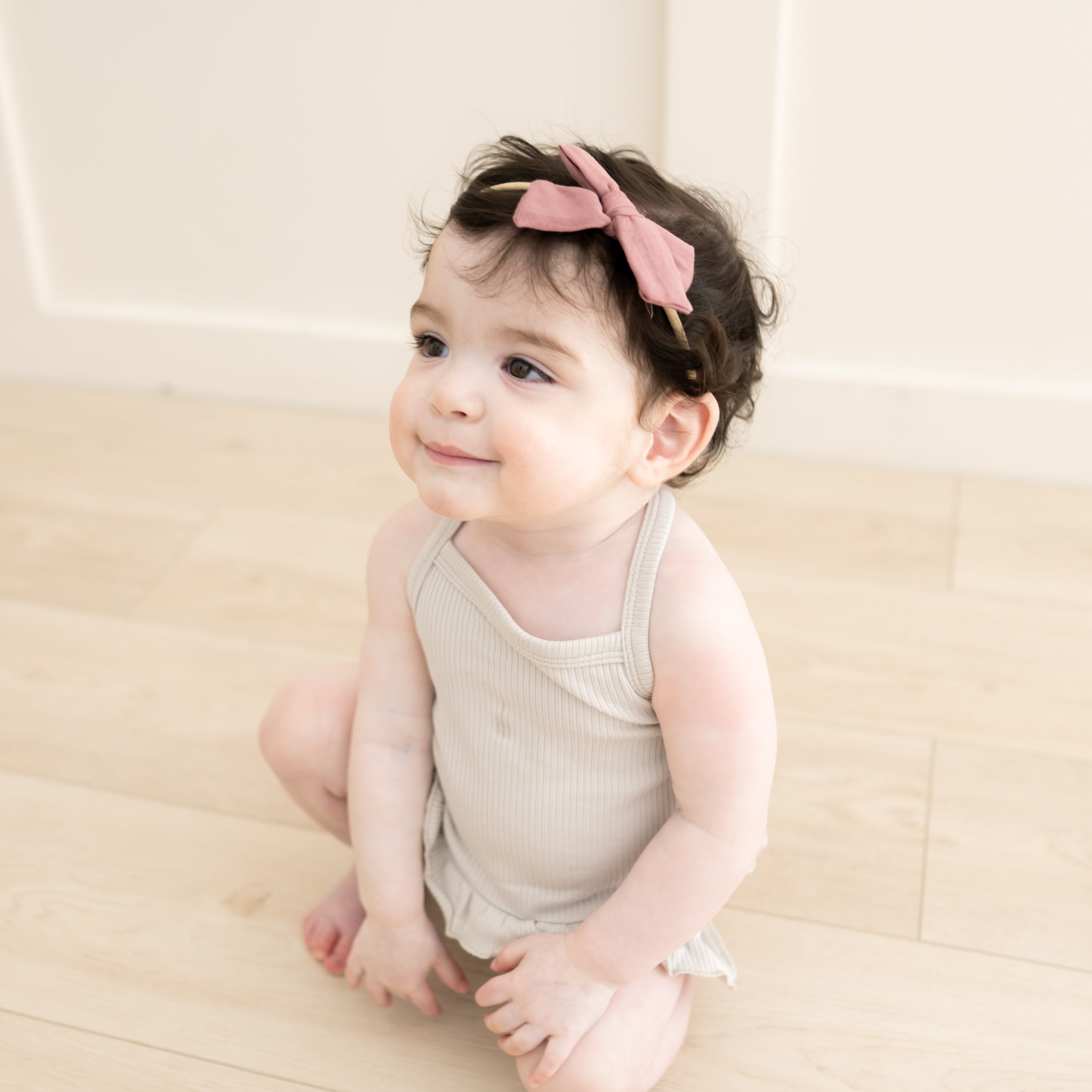 Toddler wearing Pink Bamboo Muslin Bow in Dusty Rose