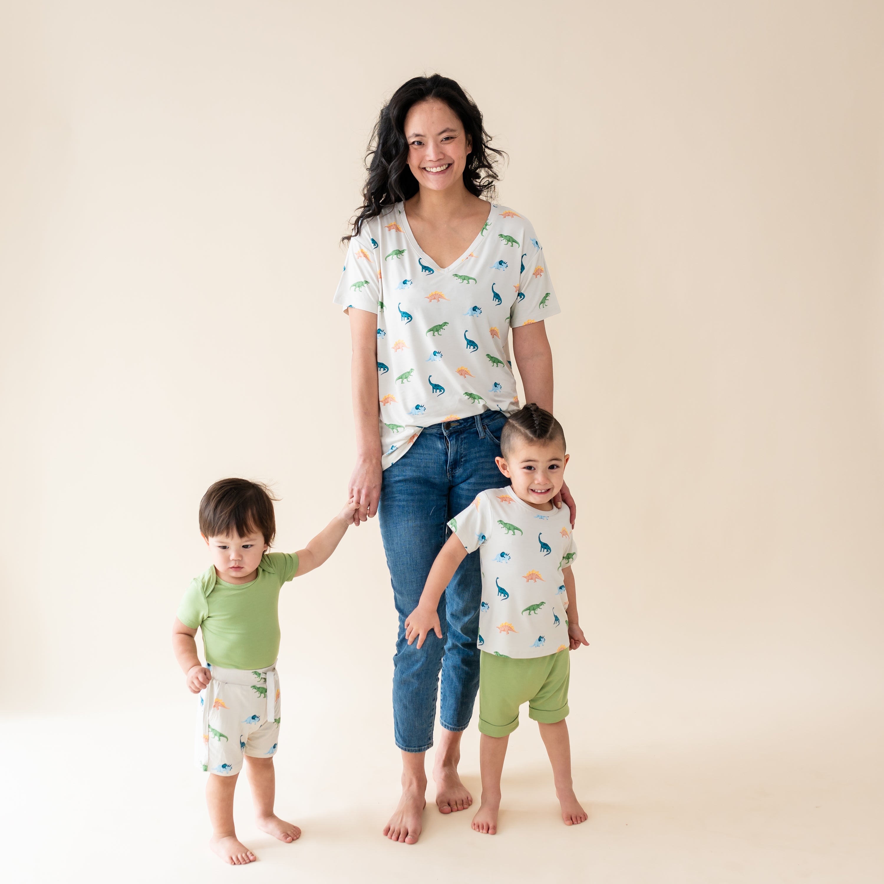 Family modeling the Ecru Roar collection