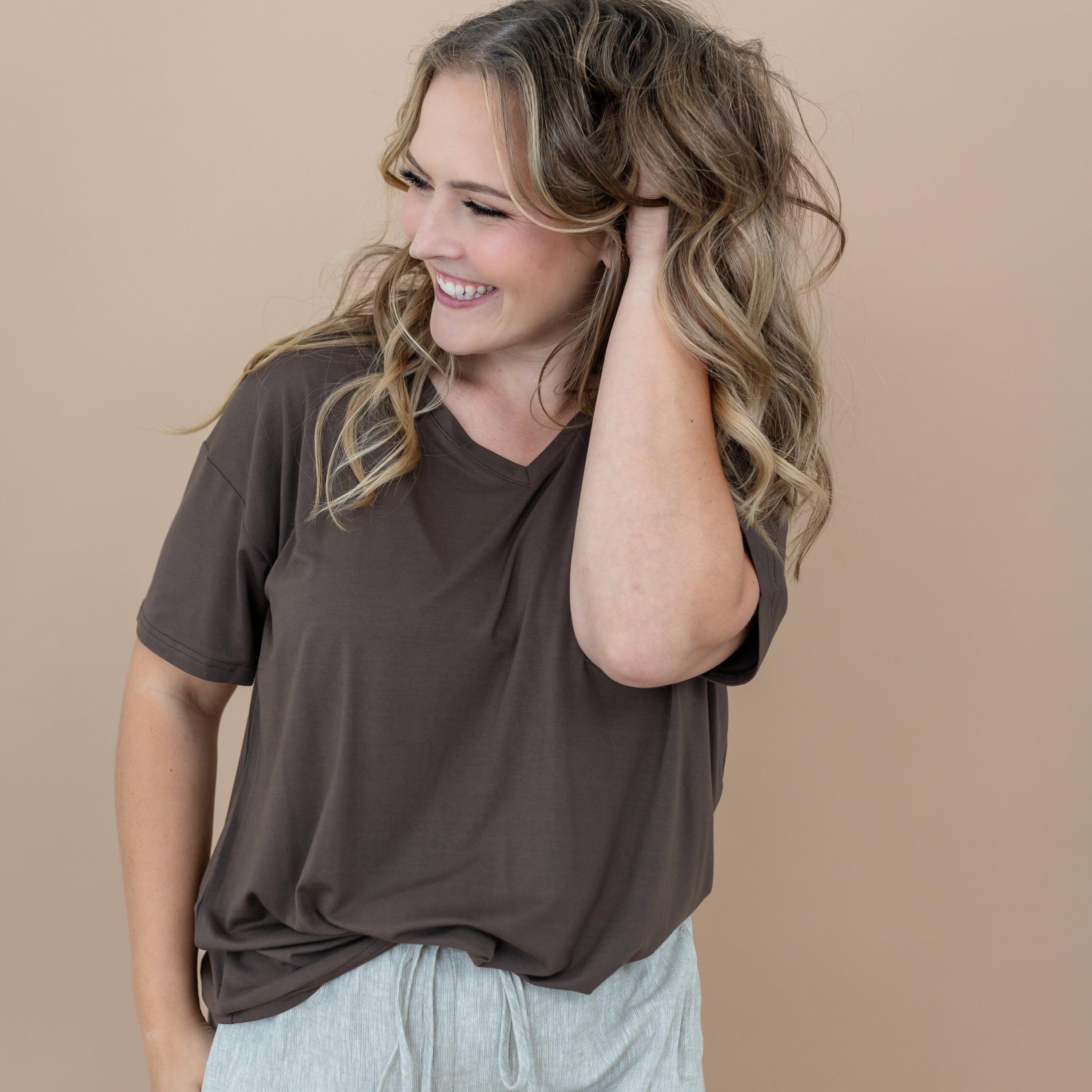 Close up of the Women’s Relaxed Fit V-Neck in Espresso on a model