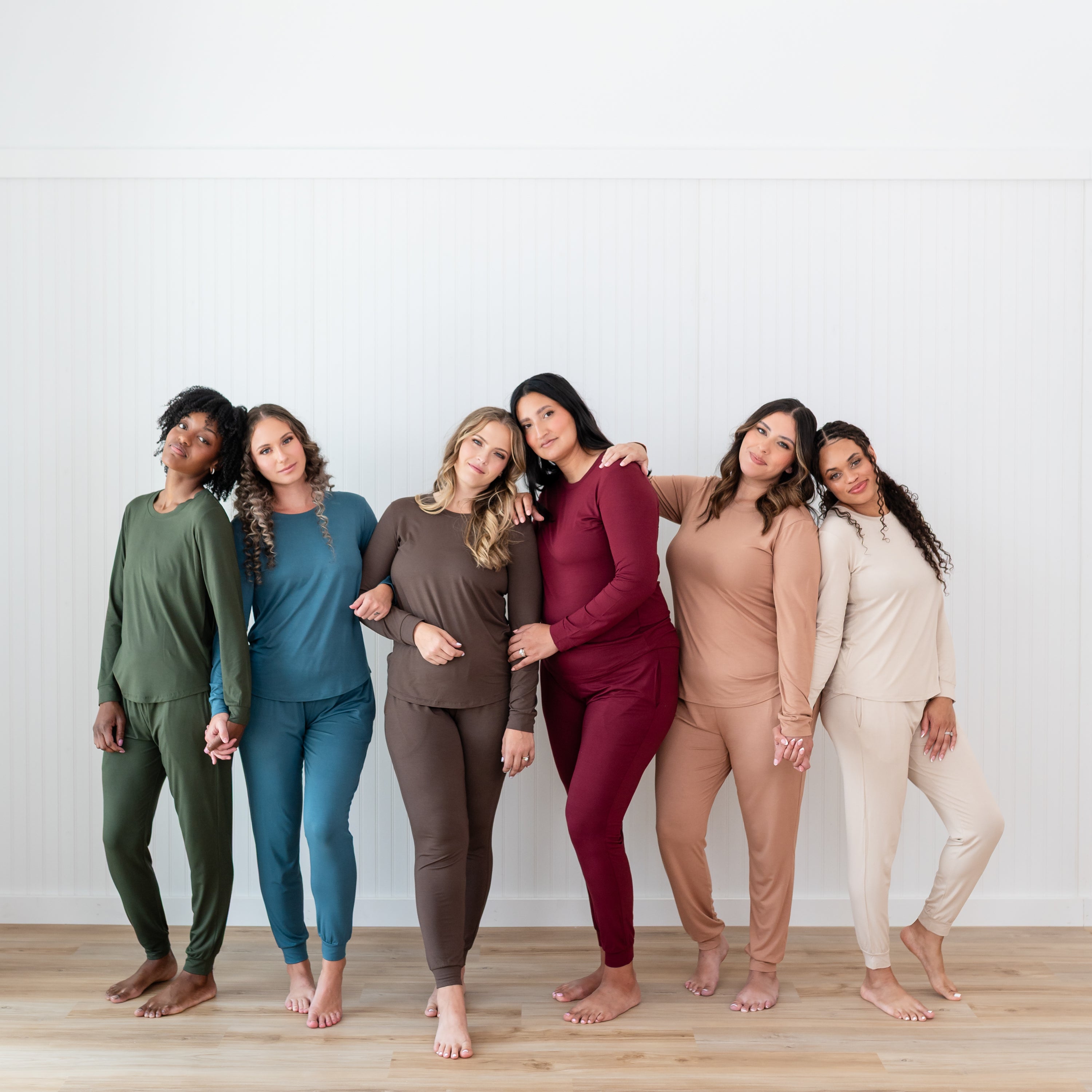 Group shot of women wearing the Women's Jogger Pajama Set in Fall colors