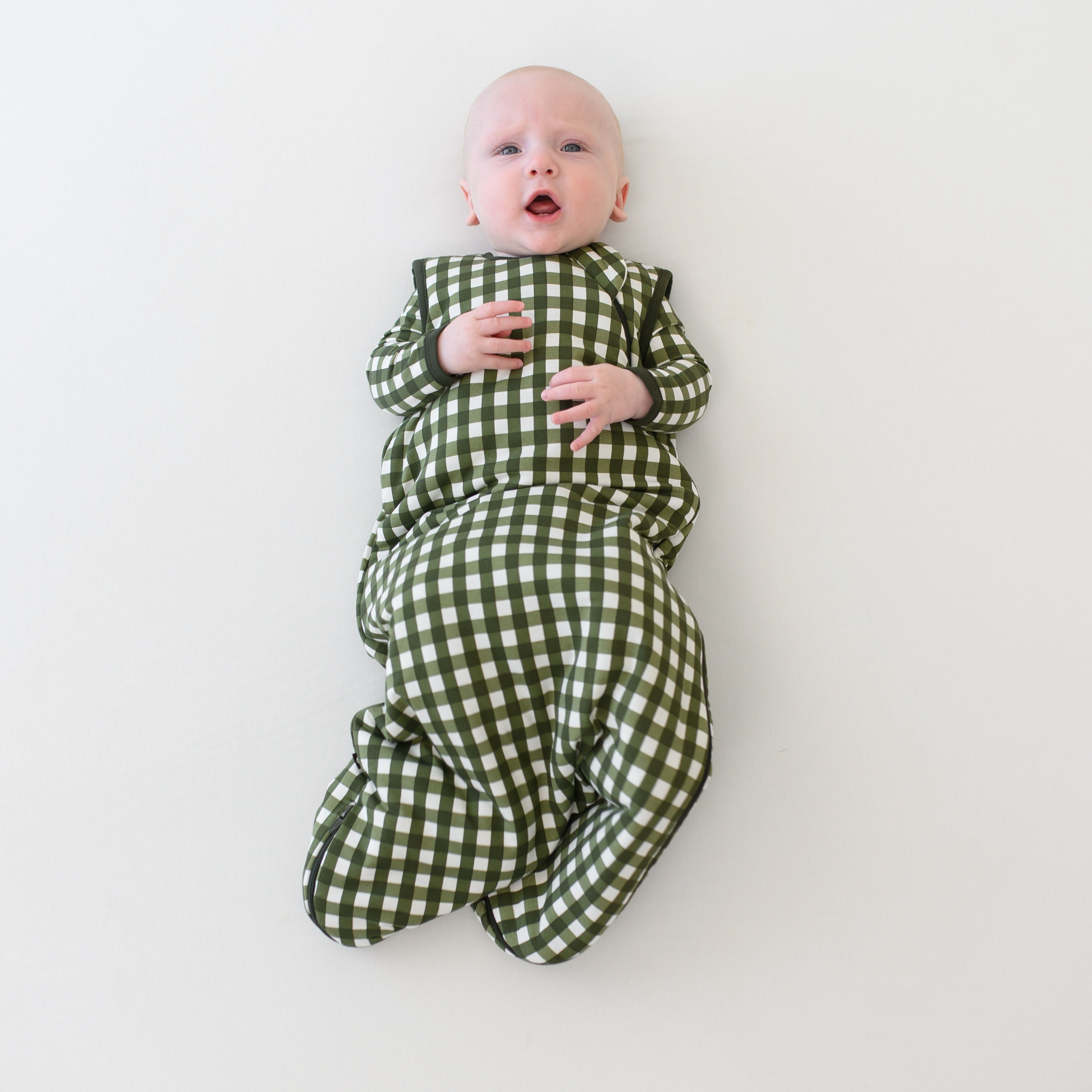 Baby wearing Sleep Bag in Gingham Fir 1.0 TOG with matching pjs