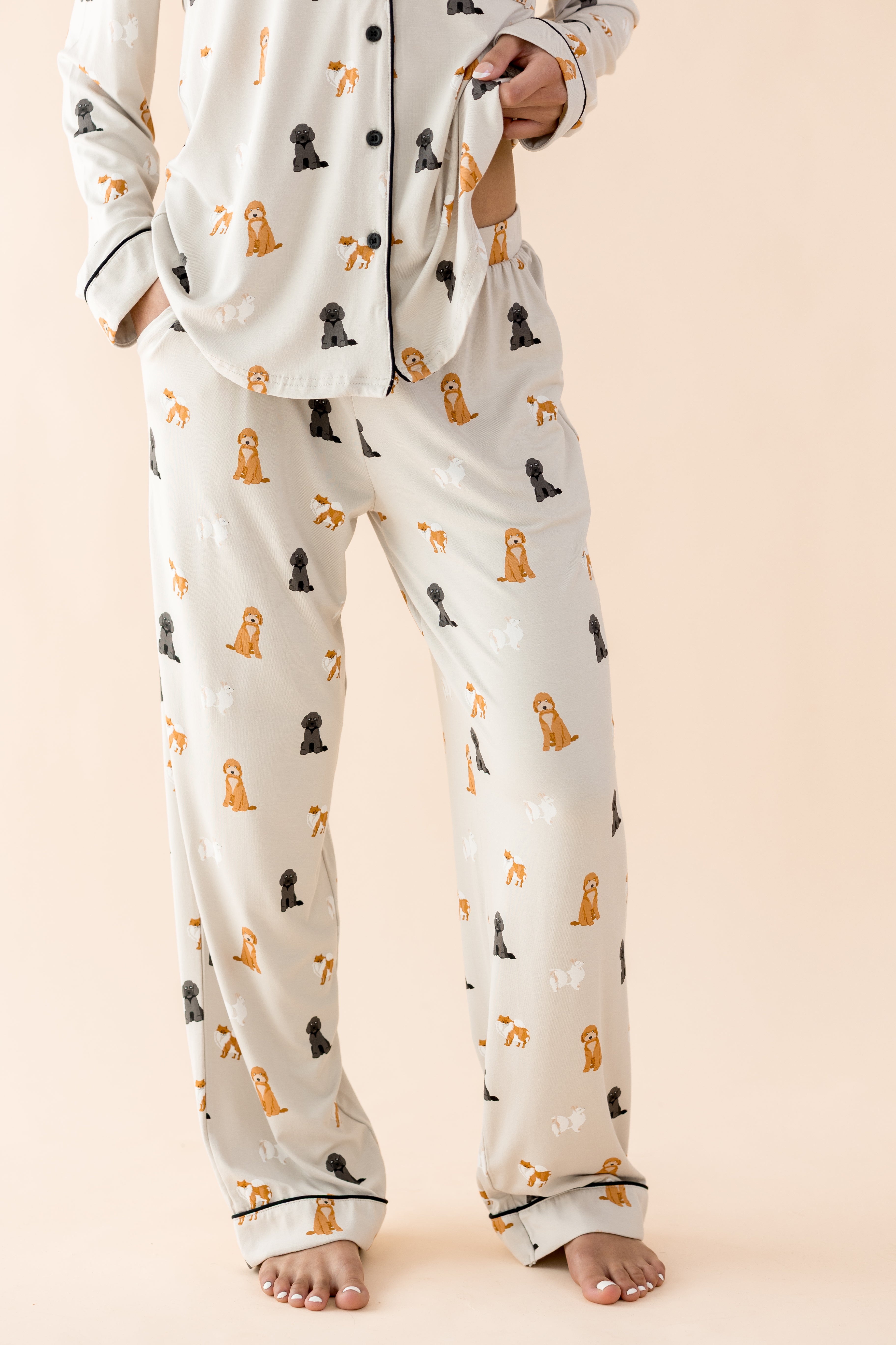 The pants of the Long-Sleeved Women's Pajama Set in Fluffy Dog shown on a model