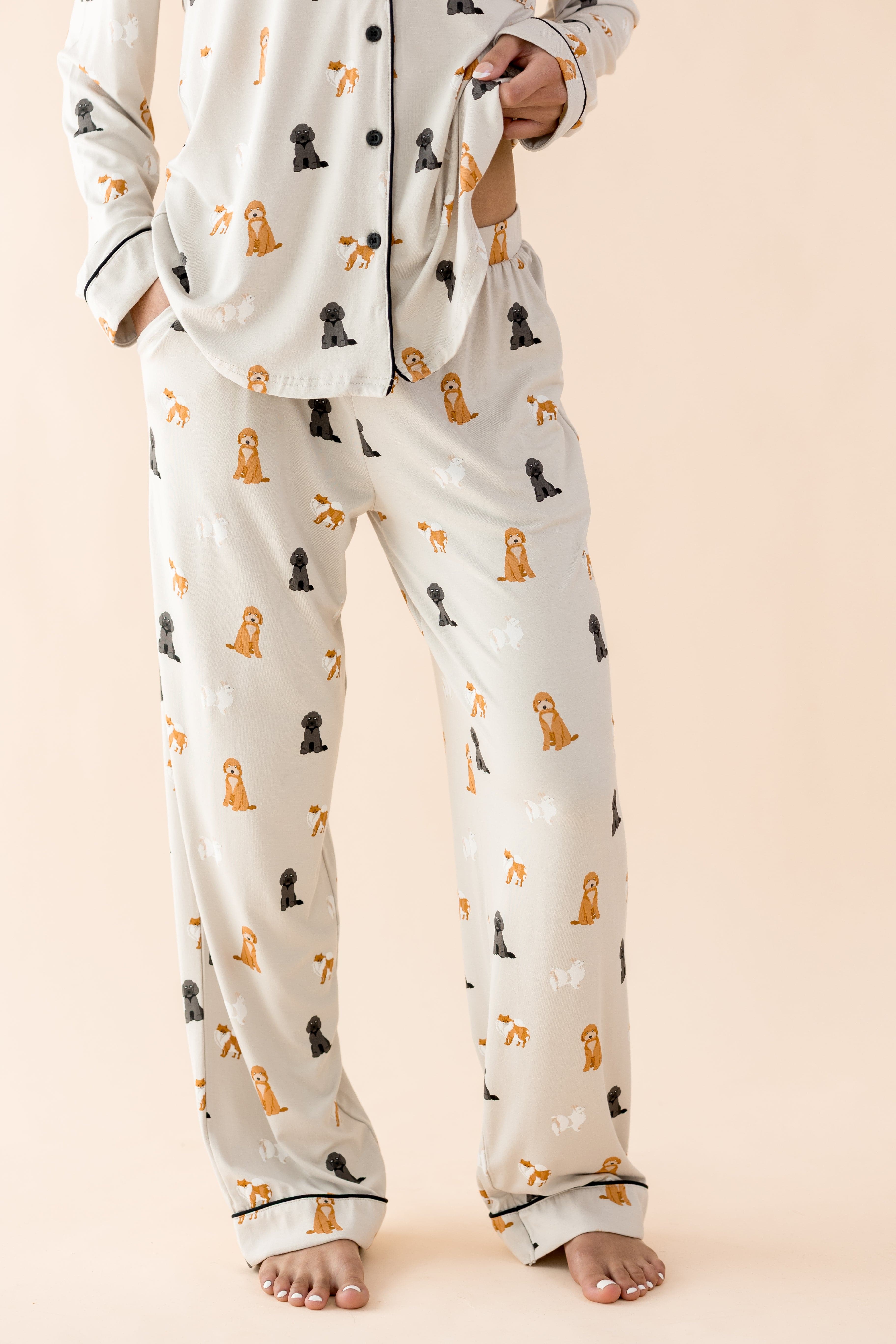 The pants of the Long-Sleeved Women's Pajama Set in Fluffy Dog shown on a model