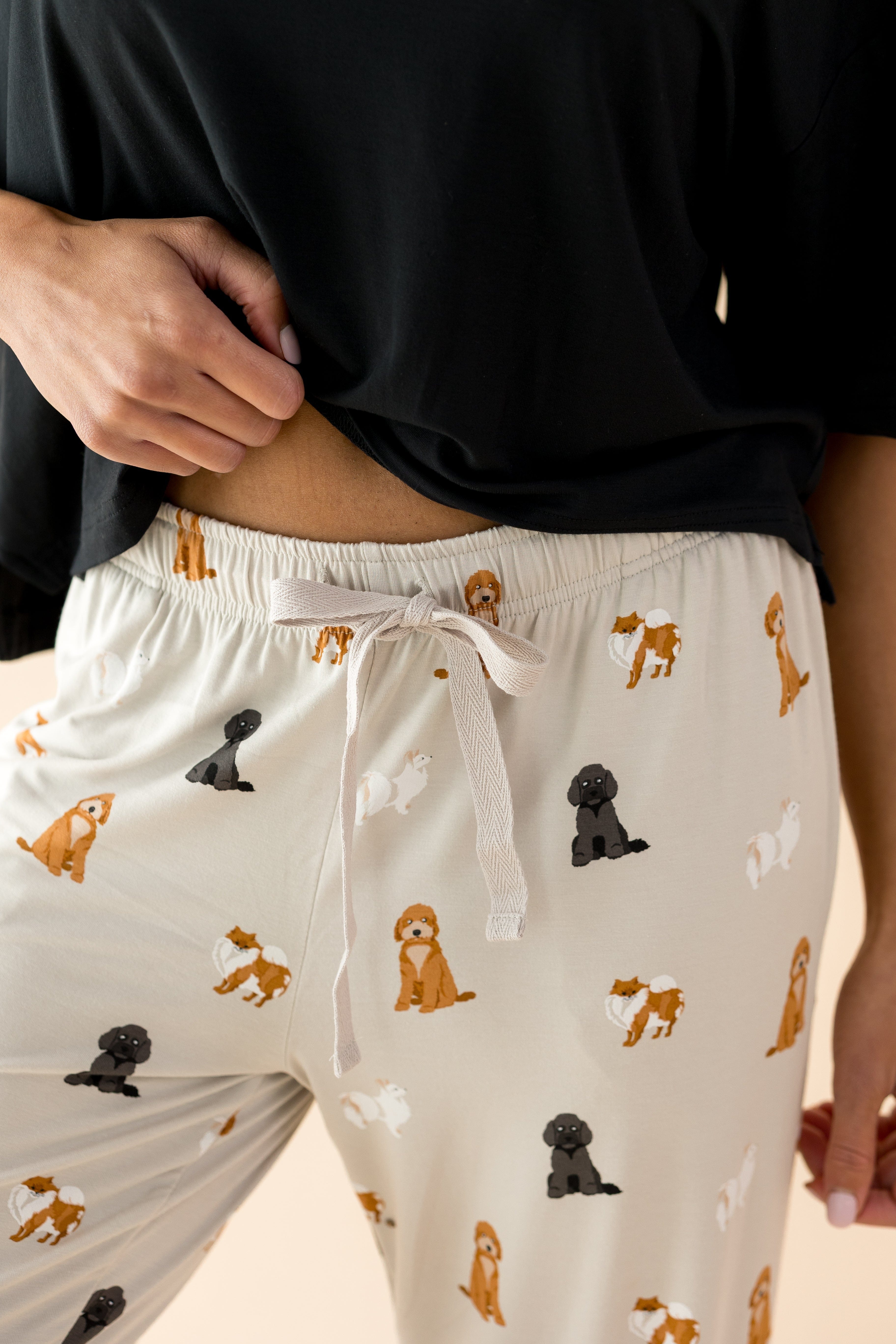 The waistband and drawstring on the Women's Lounge Pants in Fluffy Dog shown on a model