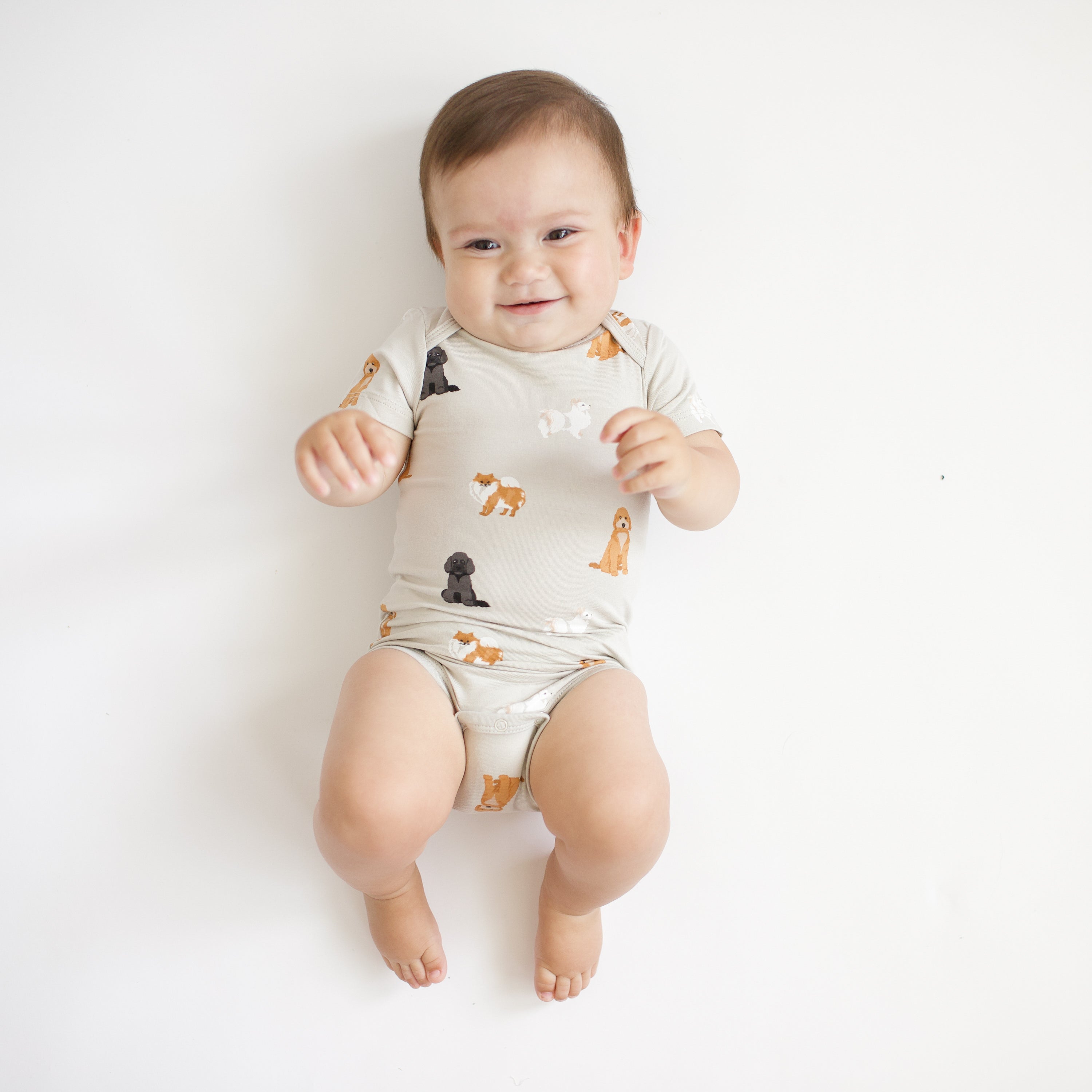 Baby wearing Bodysuit in Fluffy Dog